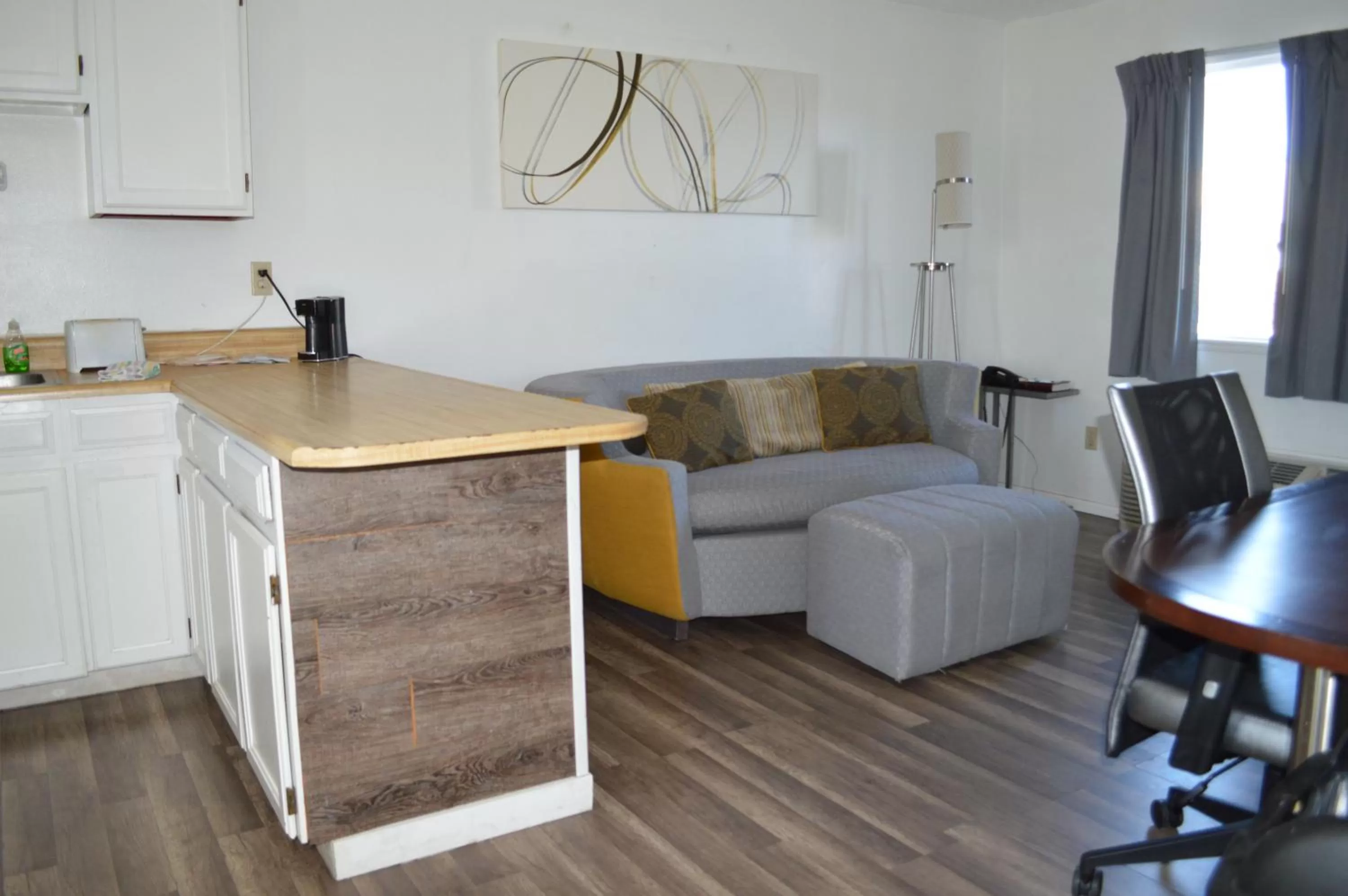 Living room in Travelodge by Wyndham Colorado Springs Airport - Peterson SFB