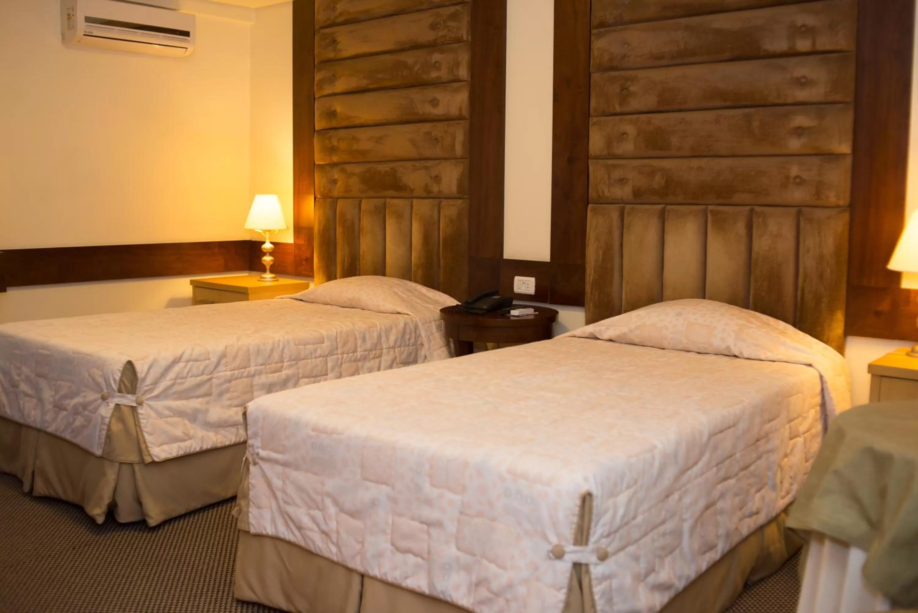 Bed in Rihad Palace Hotel