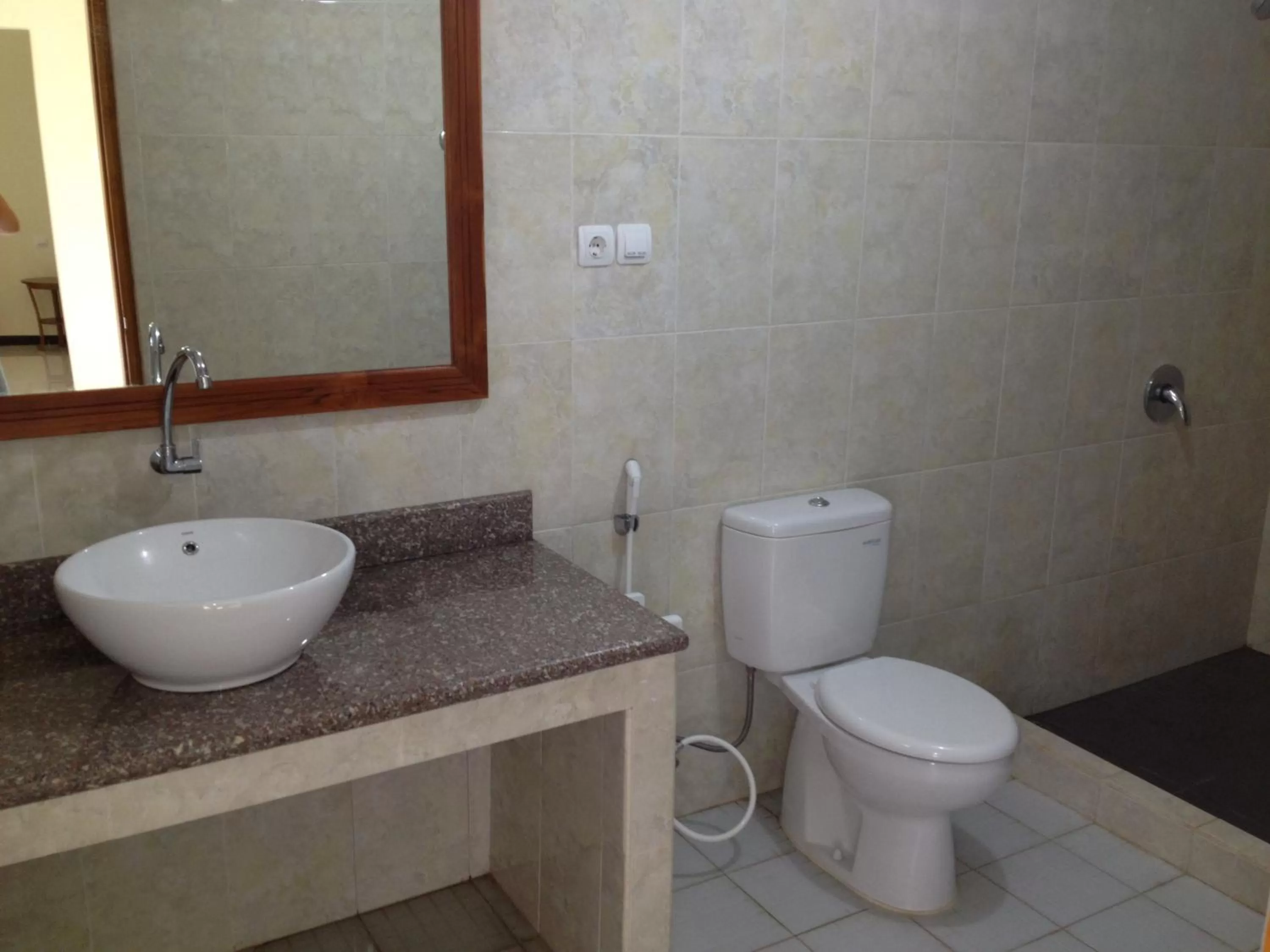 Bathroom in Astina Hotel