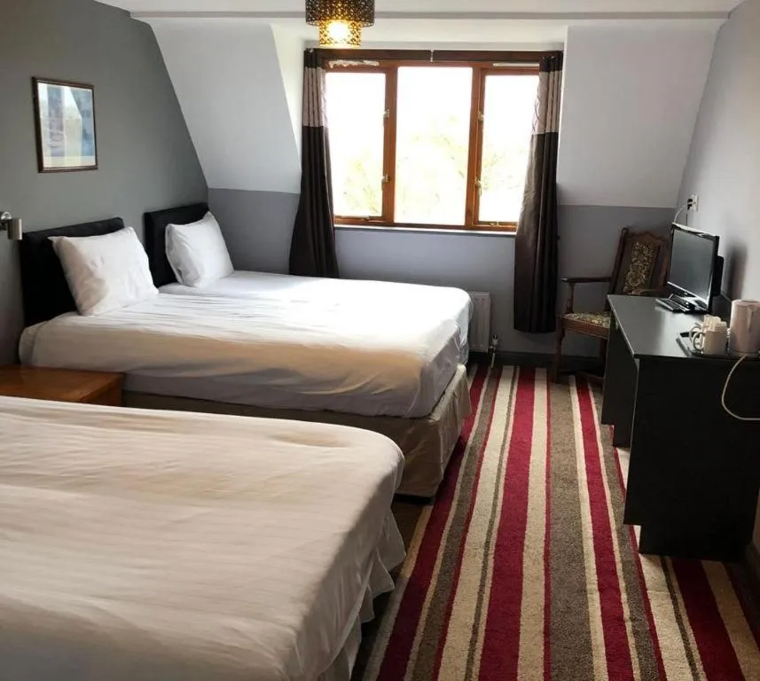 Bed in The Airman Hotel