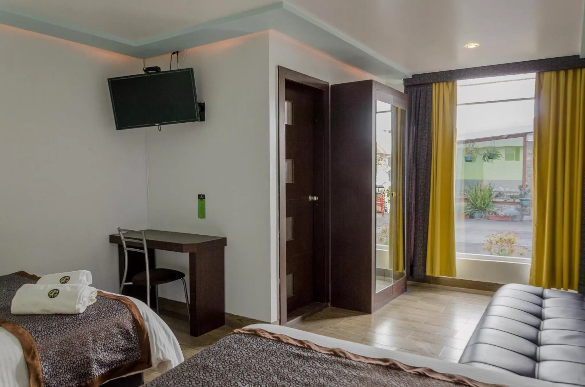 TV/Entertainment Center in Hotel Shalom