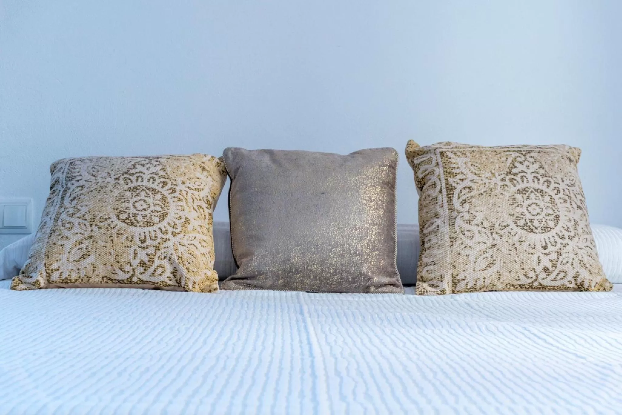 Bed in Blancos Rooms Hotel