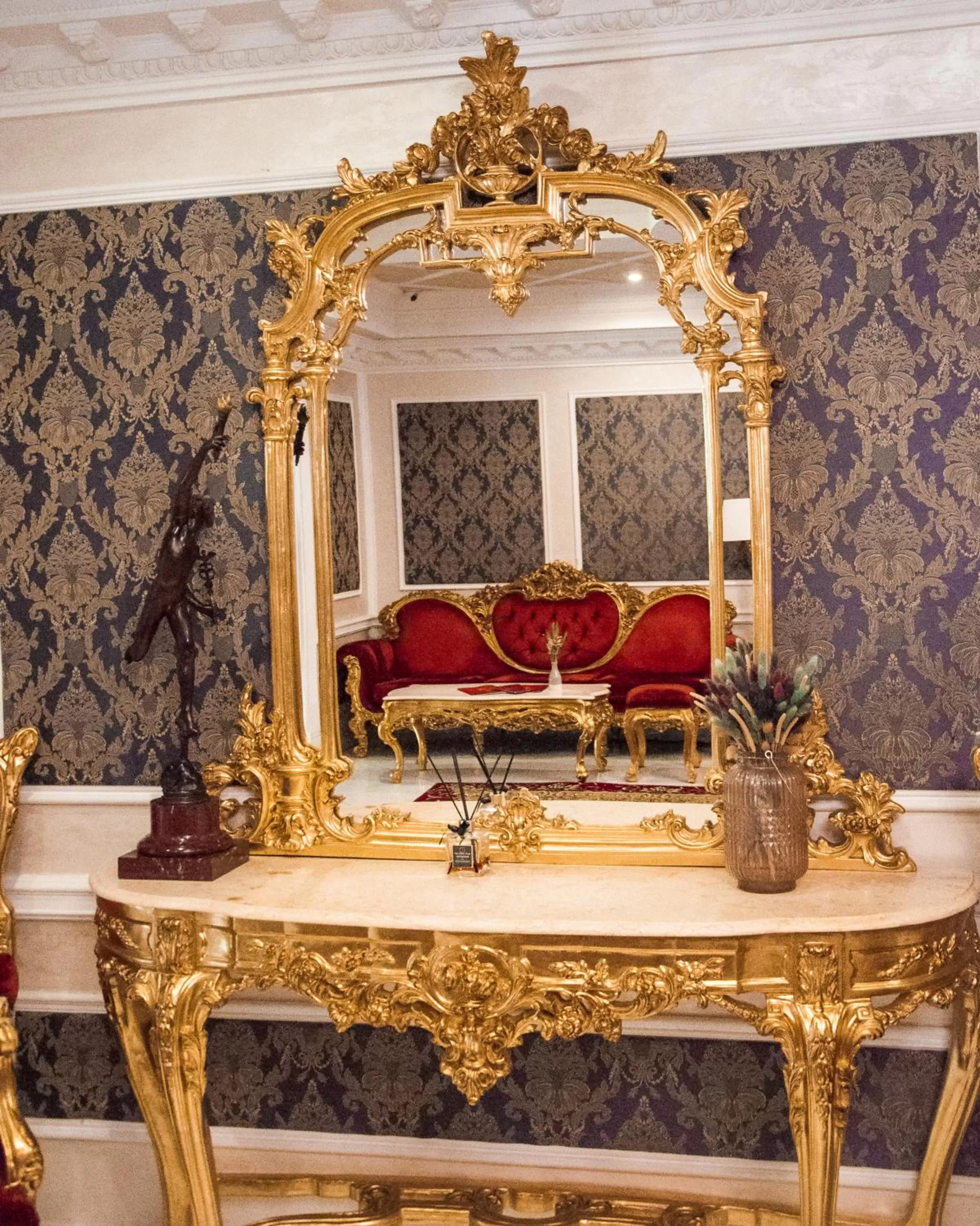 Communal lounge/ TV room, Seating Area in Royal Olympic Hotel