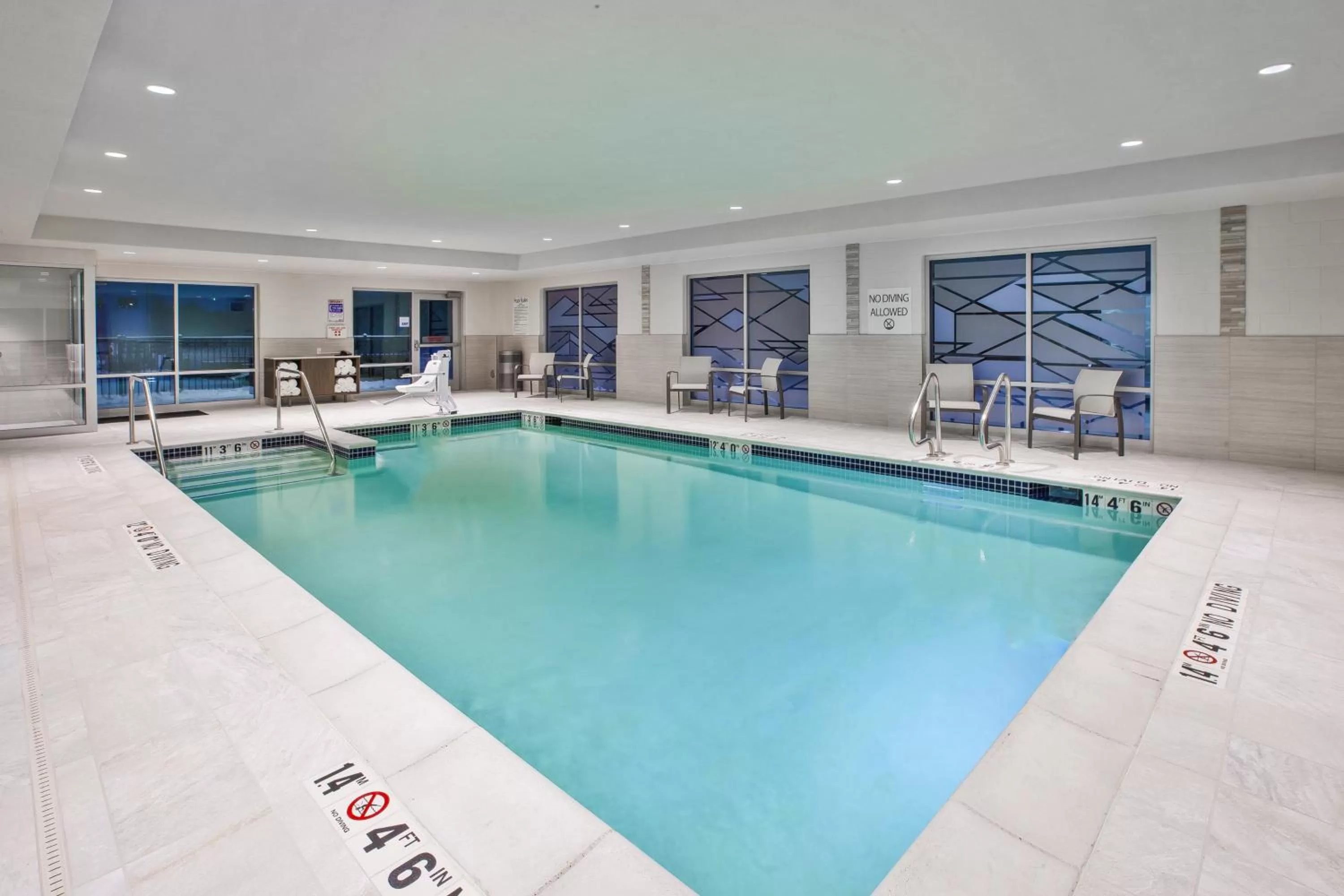 Swimming pool in Holiday Inn Express & Suites Okemos - University Area by IHG