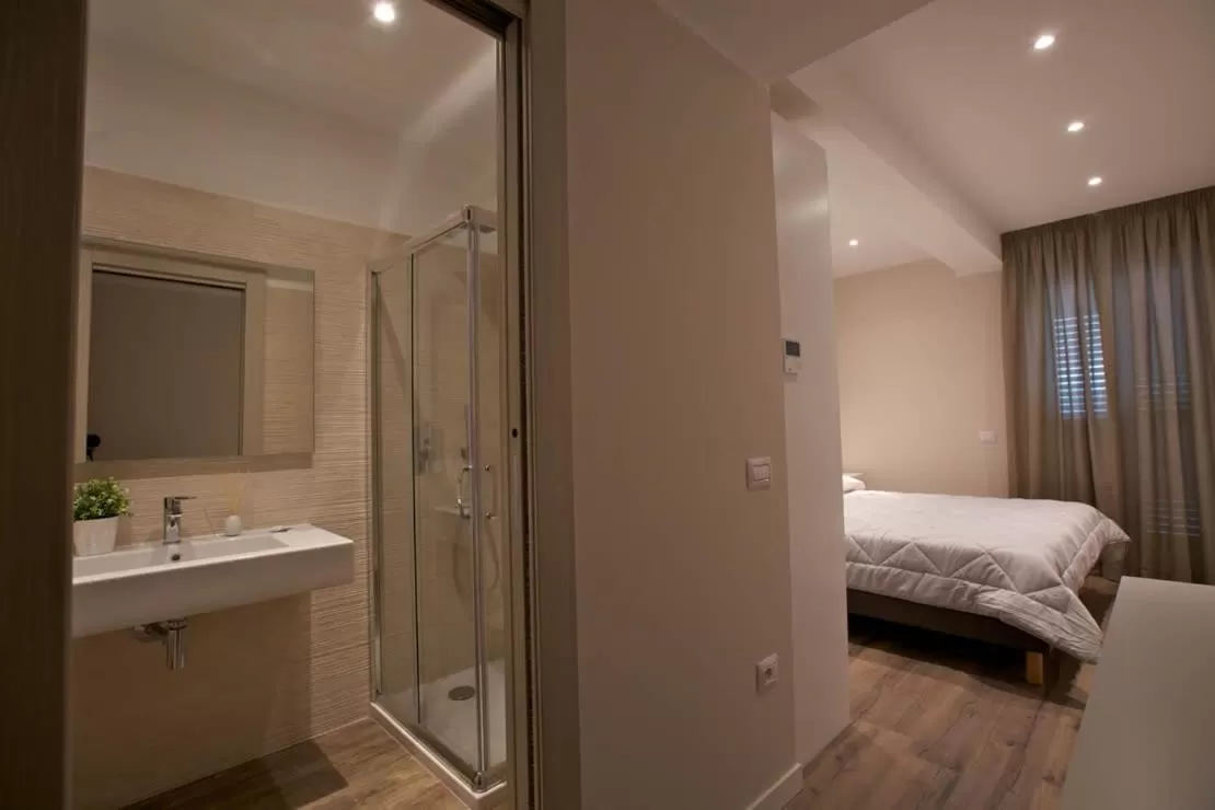 Bed in Onorati Hotel