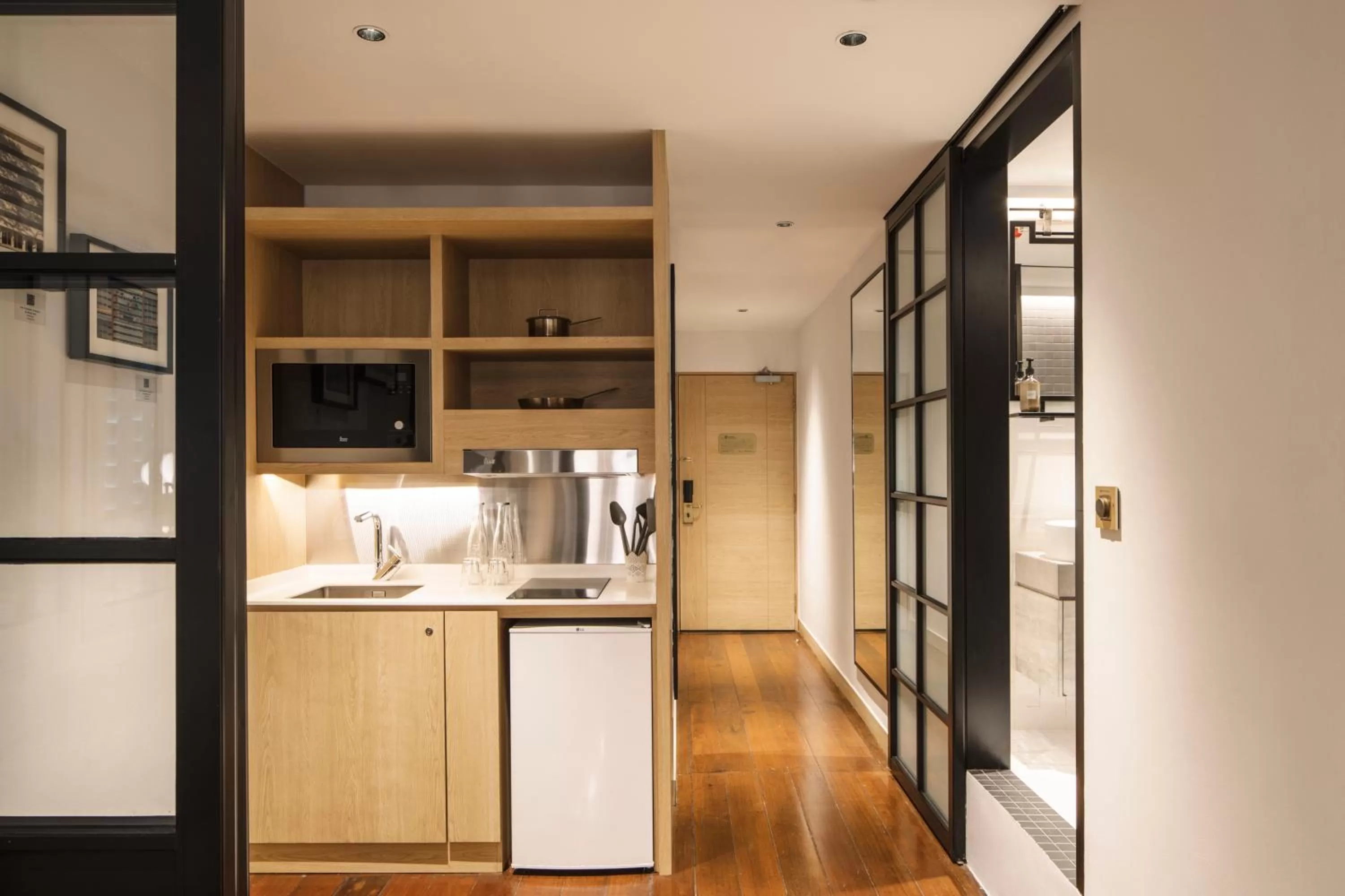 Kitchen or kitchenette in KēSa House, The Unlimited Collection managed by The Ascott Limited