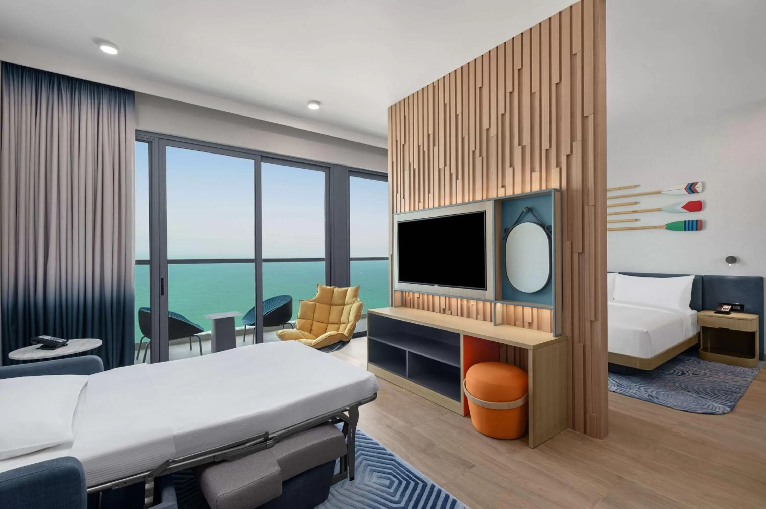 Living room, Bed in Hampton by Hilton Marjan Island