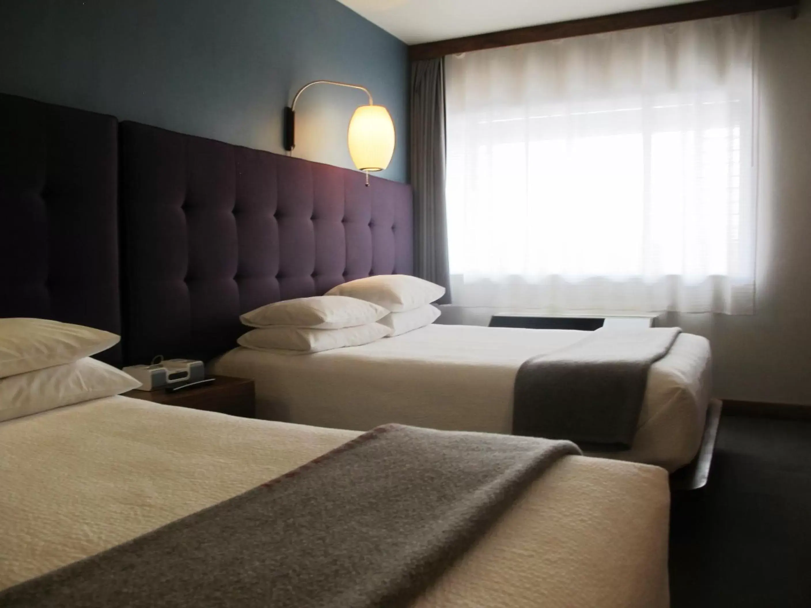 Queen Room with Two Queen Beds in Modern Hotel Queen Room with Two Queen Beds in Modern Hotel