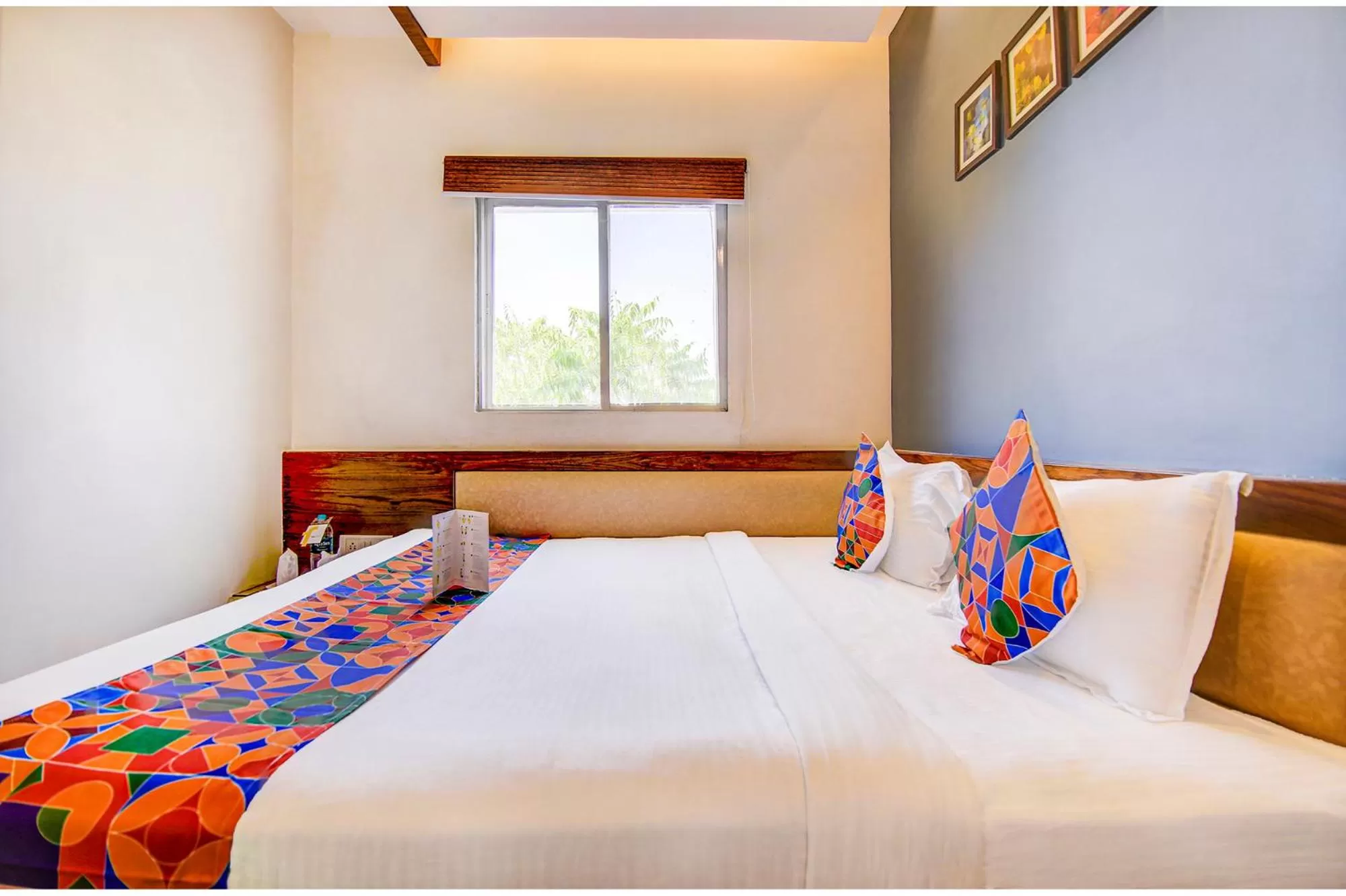 Bedroom in FabHotel The Khushi Regent