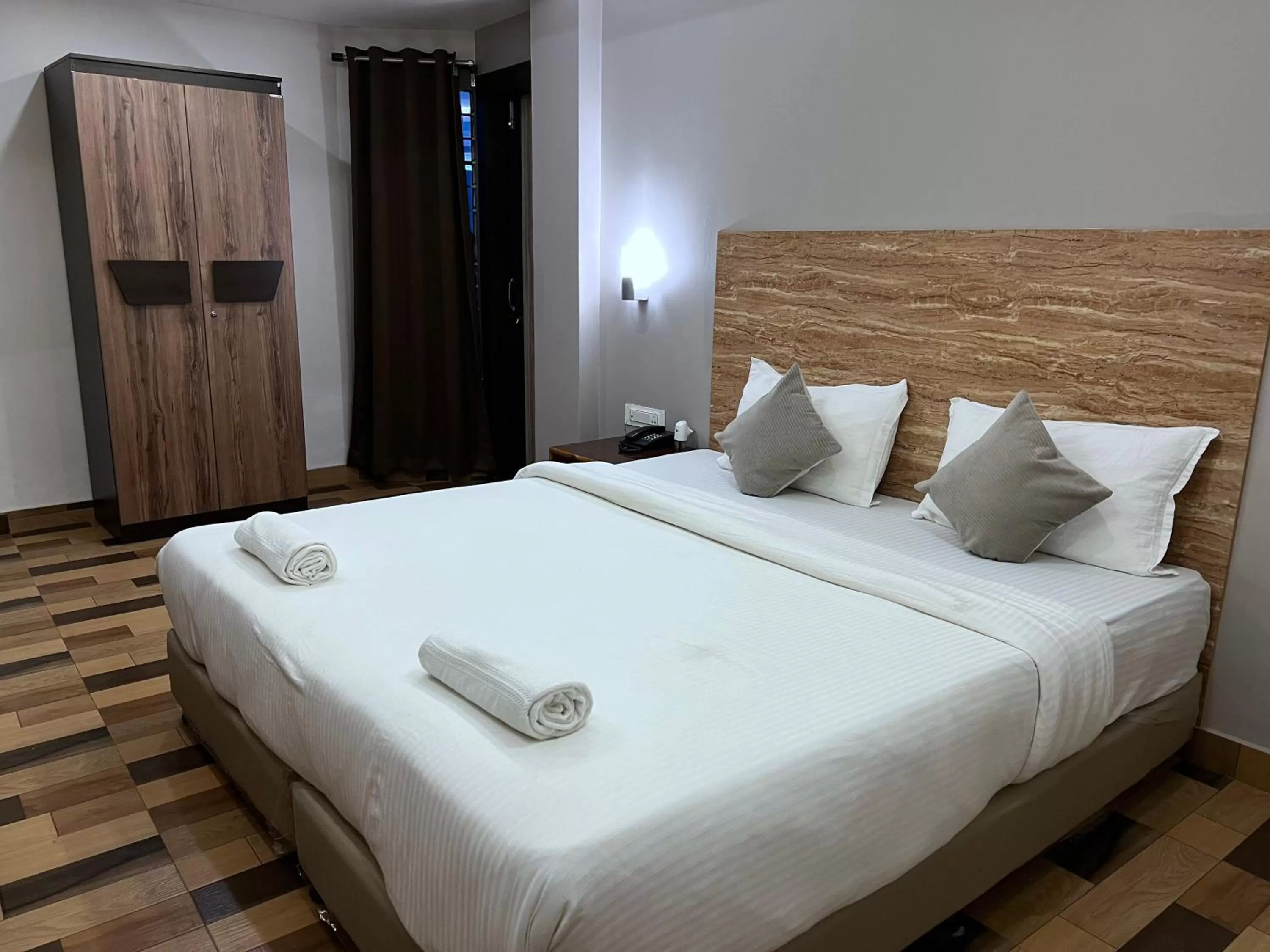 Bed in The Phoenix Residency