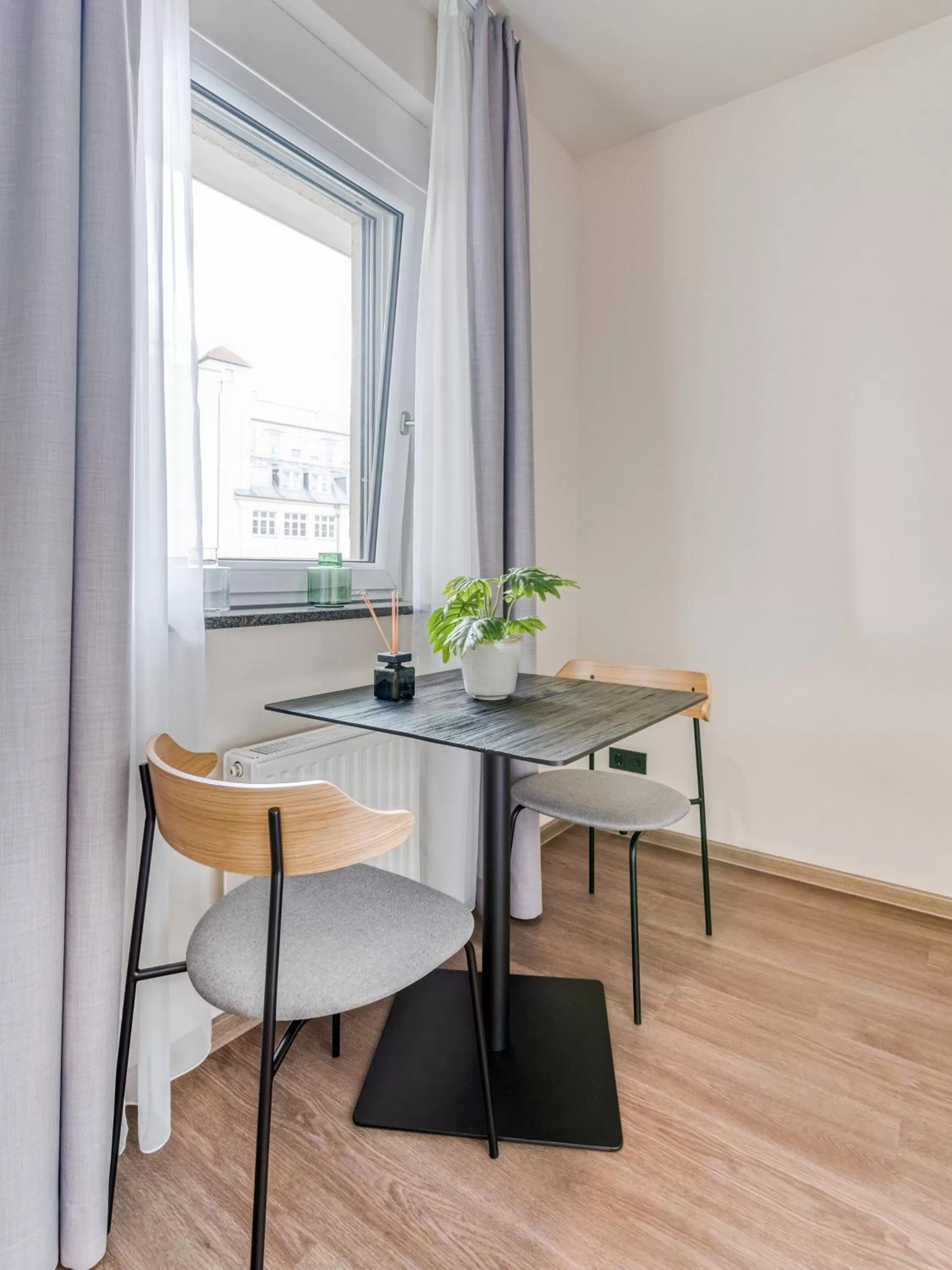 Dining area in Limehome Leipzig Oelßner's Hof