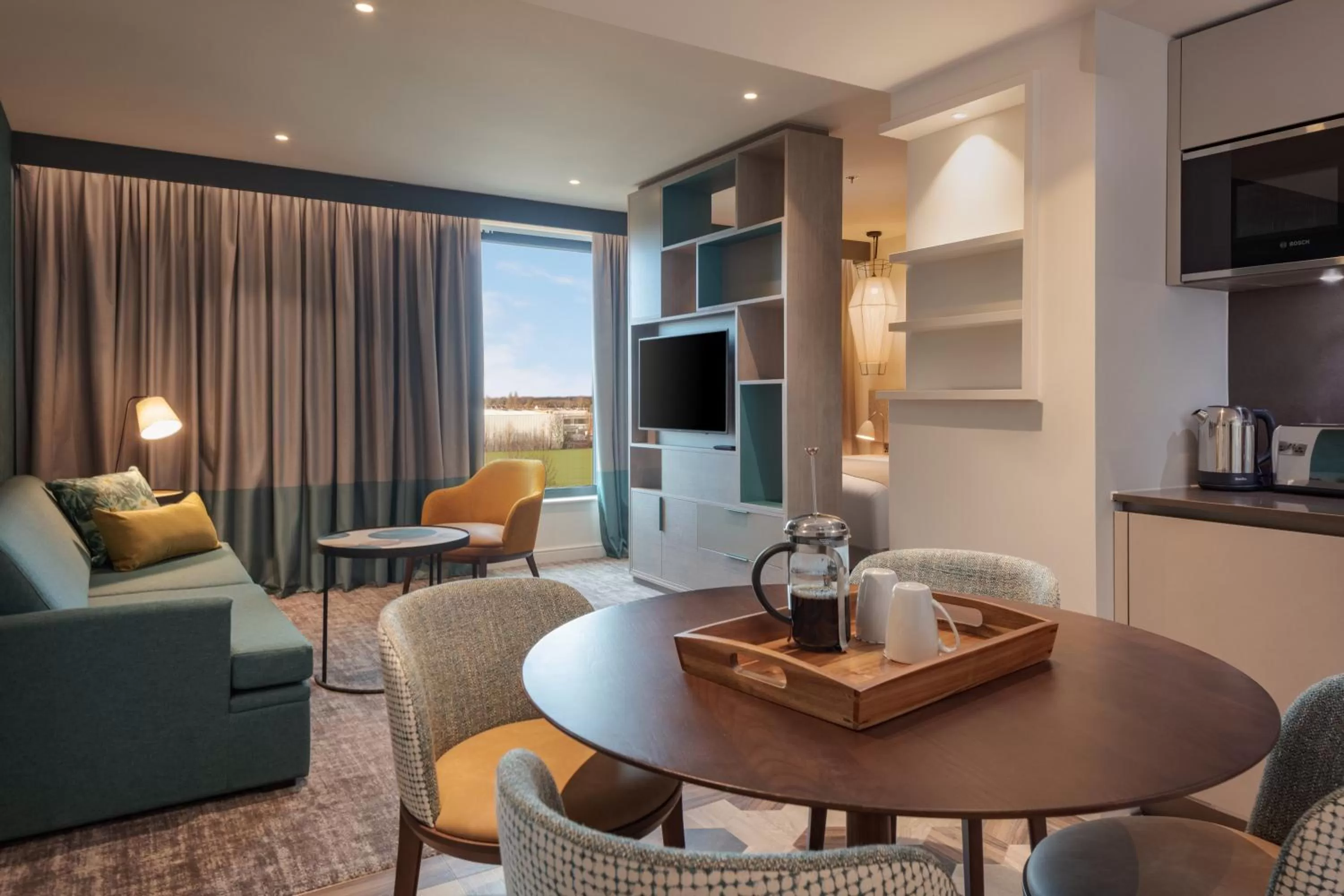 TV and multimedia in Staybridge Suites London Heathrow - Bath Road, an IHG Aparthotel