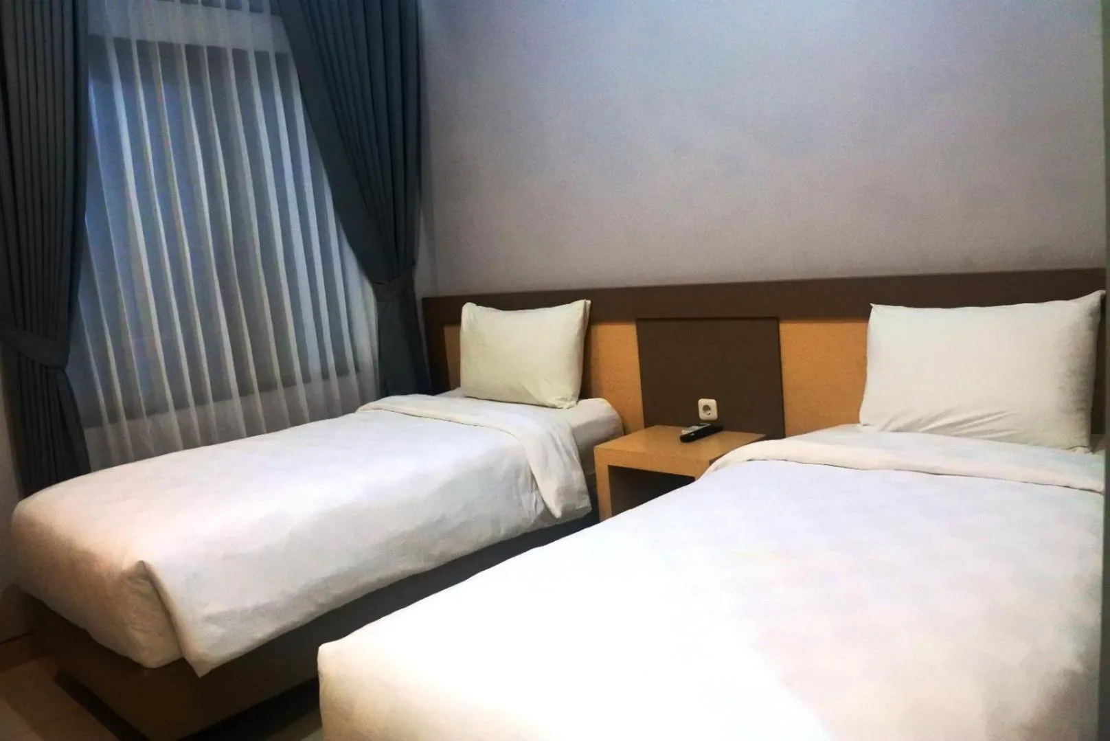 Bed in Grand Cordela Hotel AS Putra Kuningan