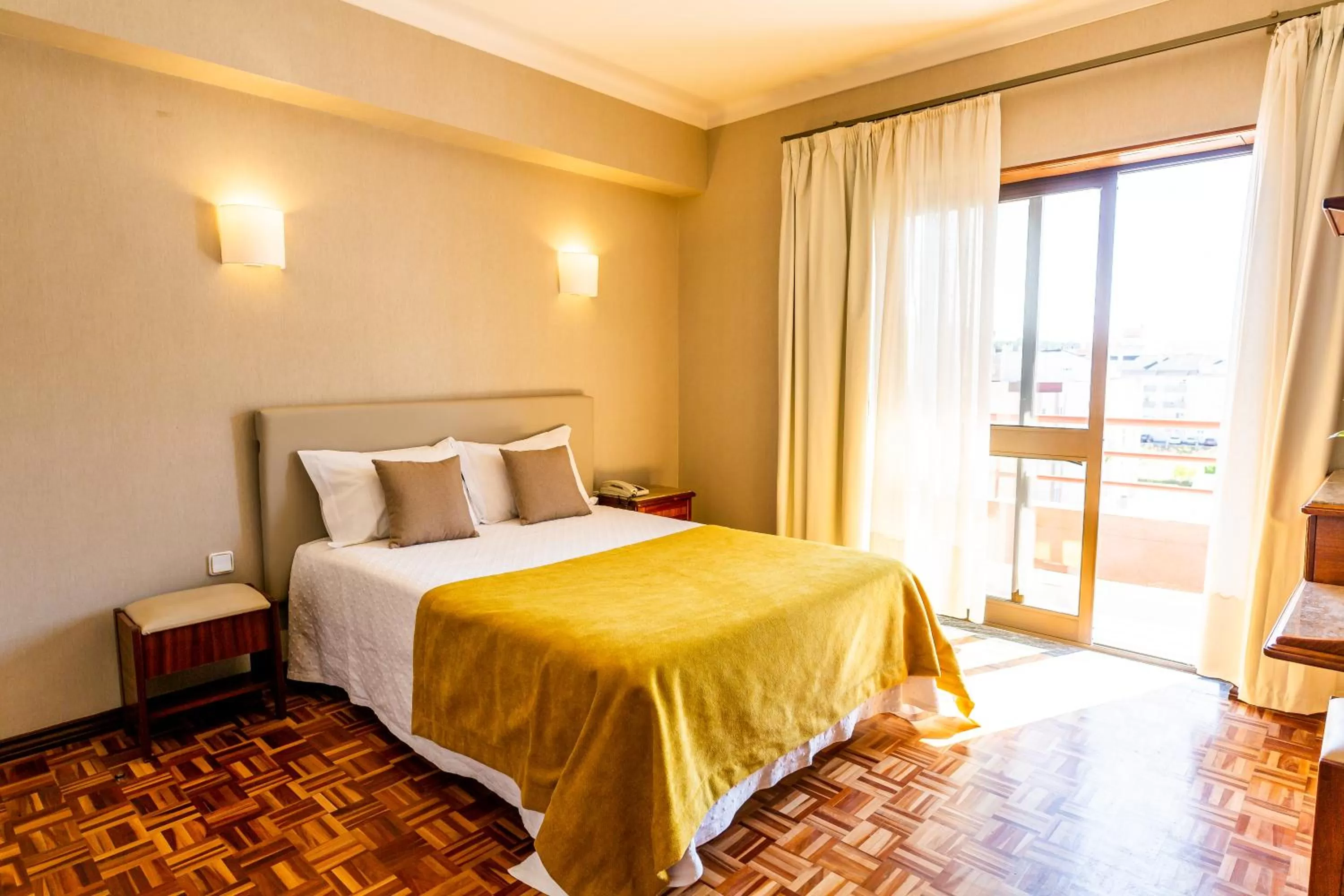 Bed in Dona Amélia Hotel by RIDAN Hotels