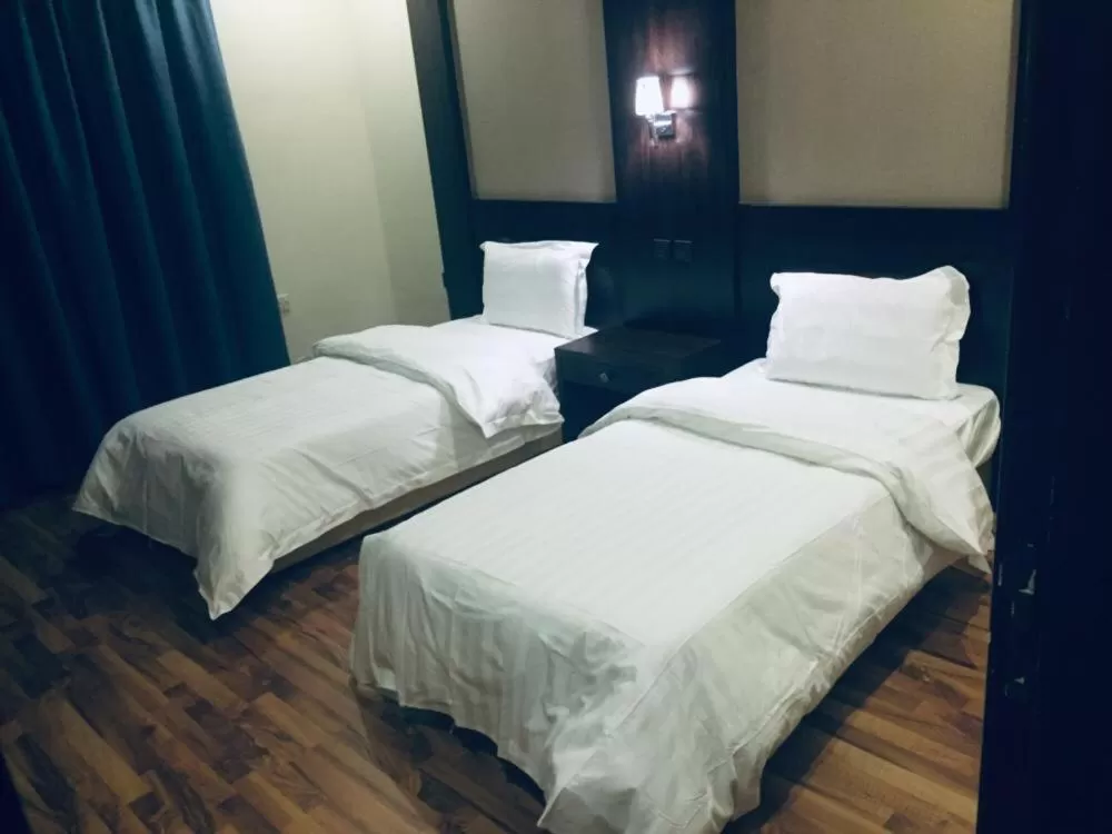 Bed in Drr Ramah Hotel Apartments 10