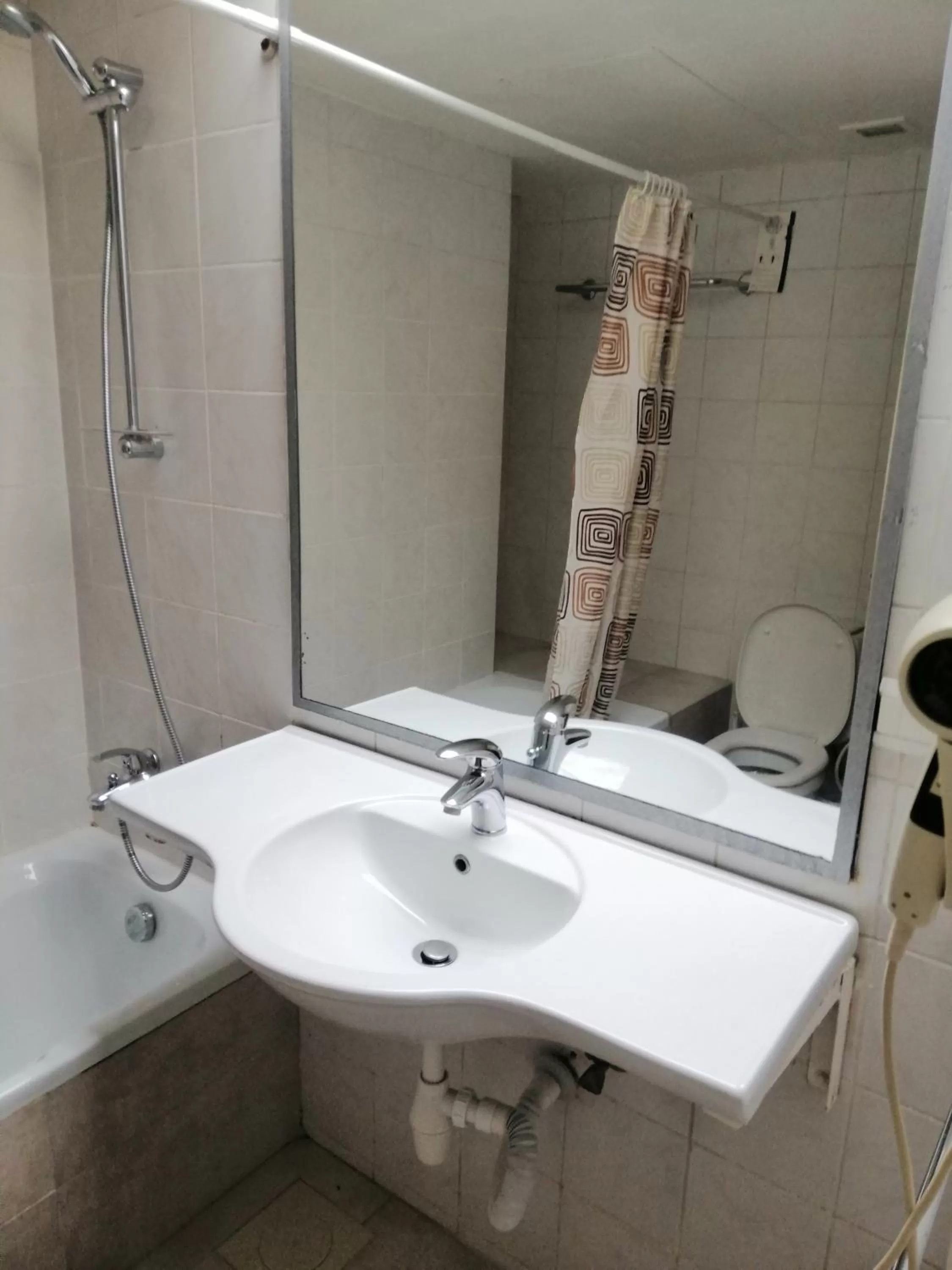 Bathroom in Bella Riva Hotel