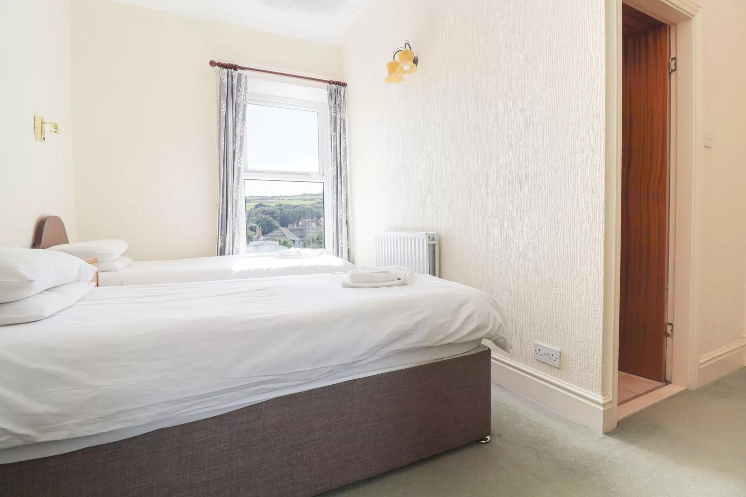 Bed in Falcon's Nest Hotel