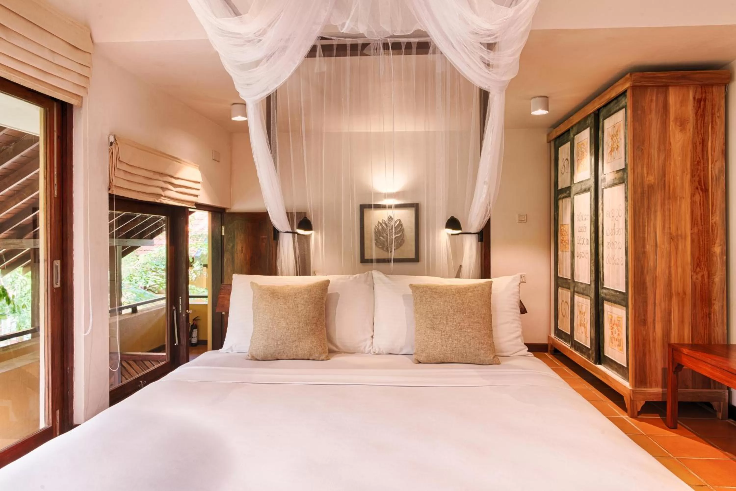 Bed in Jetwing Ayurveda Pavilions