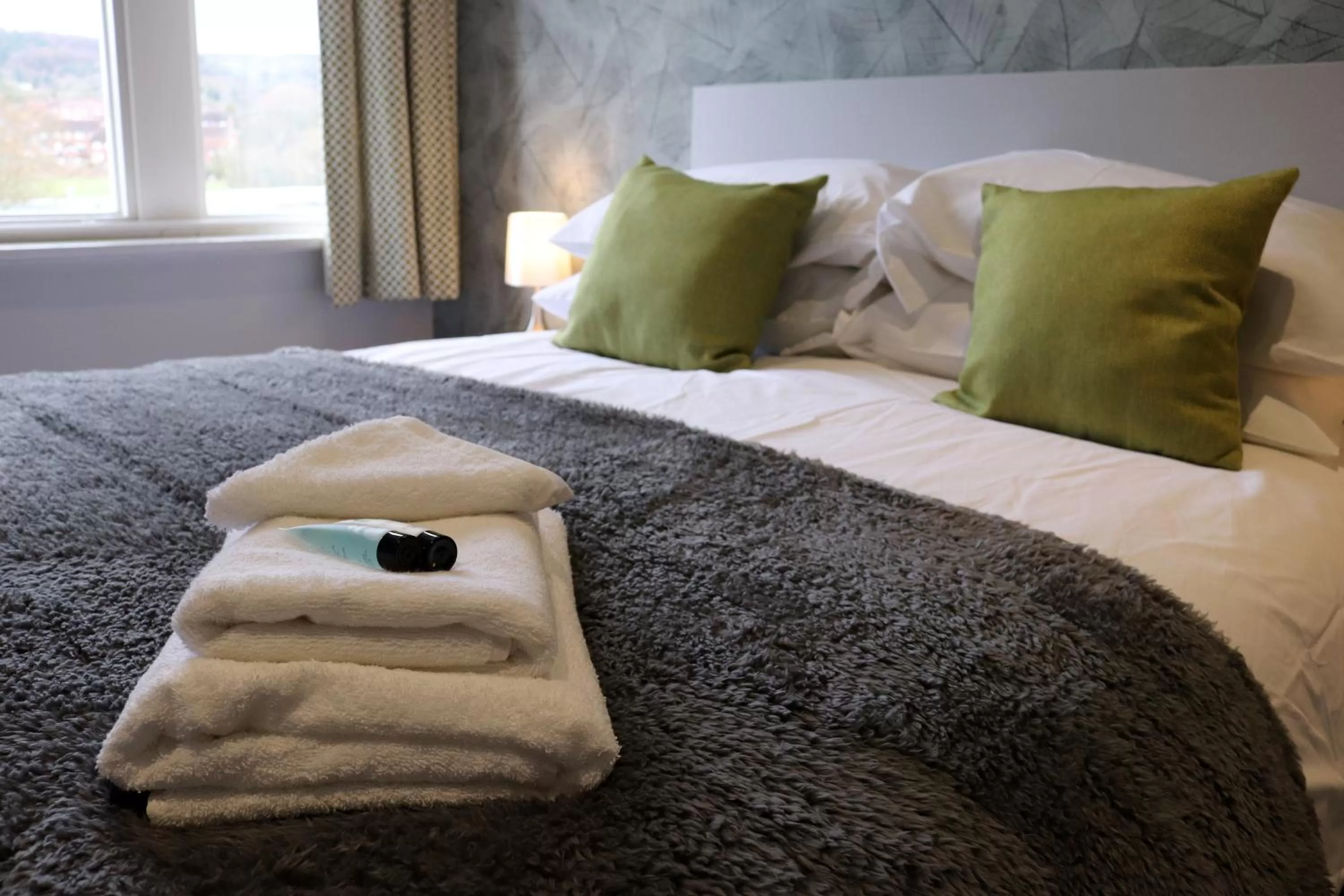 Bed in The Bridge Inn Hotel