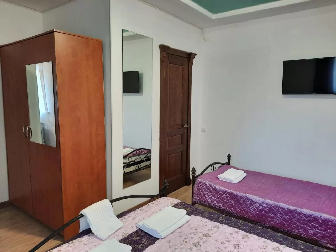 Bed in Zhaylau Hotel