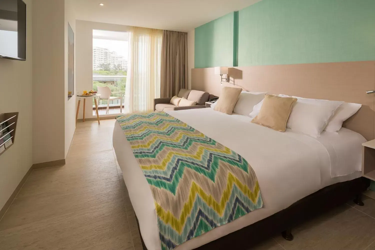 Superior Queen Room with Sofa Bed in Mercure Santa Marta Emile Superior Queen Room with Sofa Bed in Mercure Santa Marta Emile