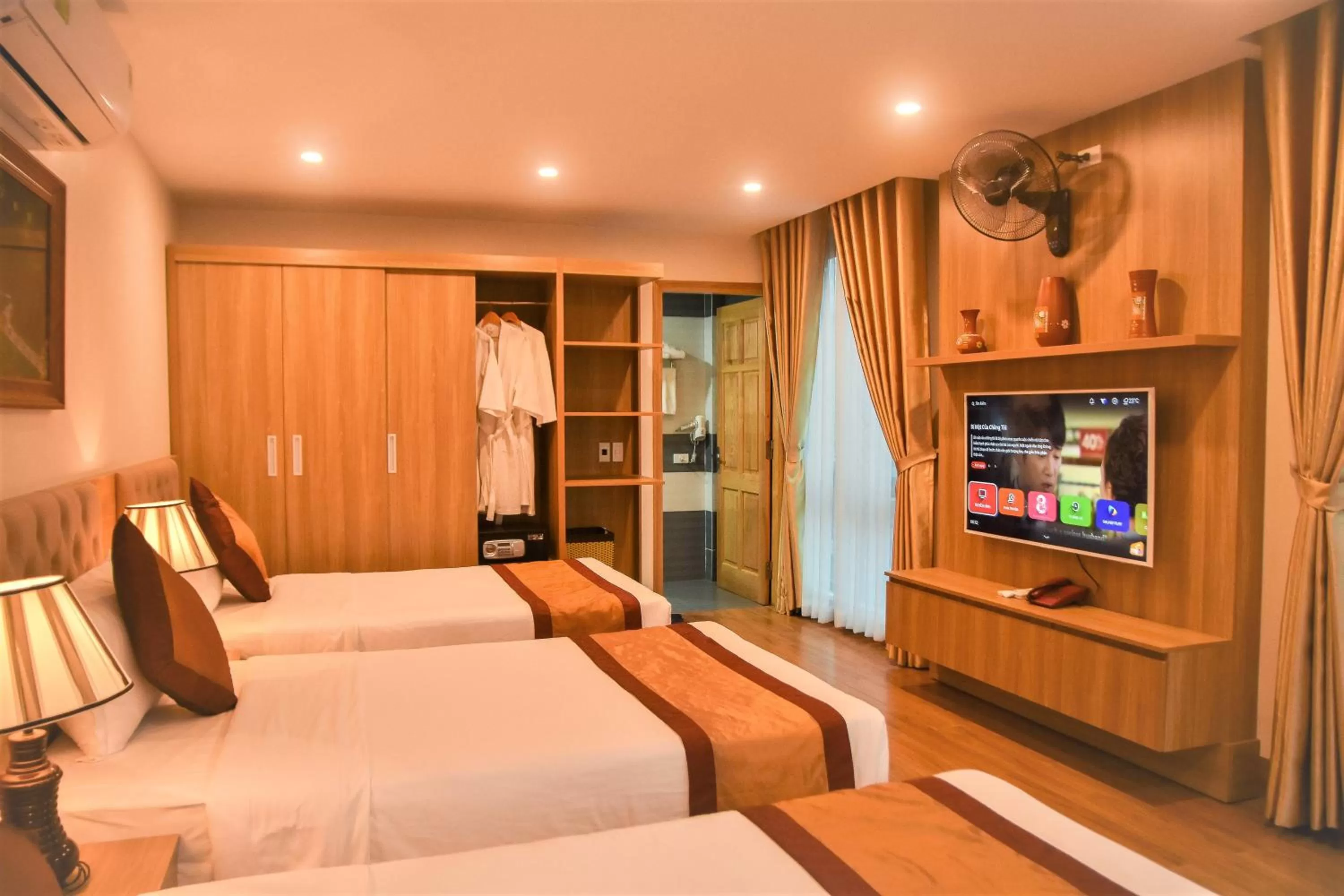 TV and multimedia, TV/Entertainment Center in Cozynibi Hotel