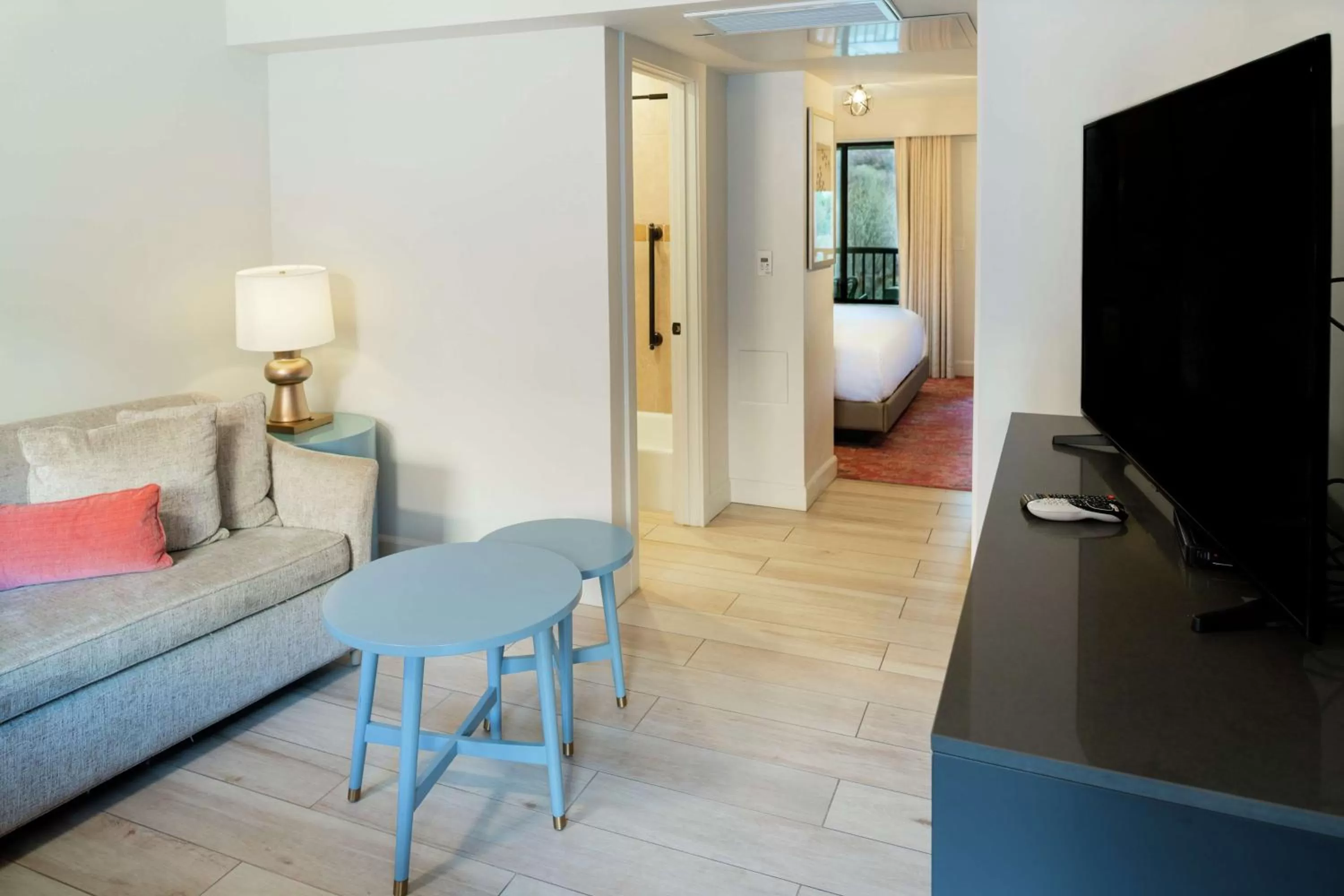 Living room in Cliffrose Springdale, Curio Collection By Hilton