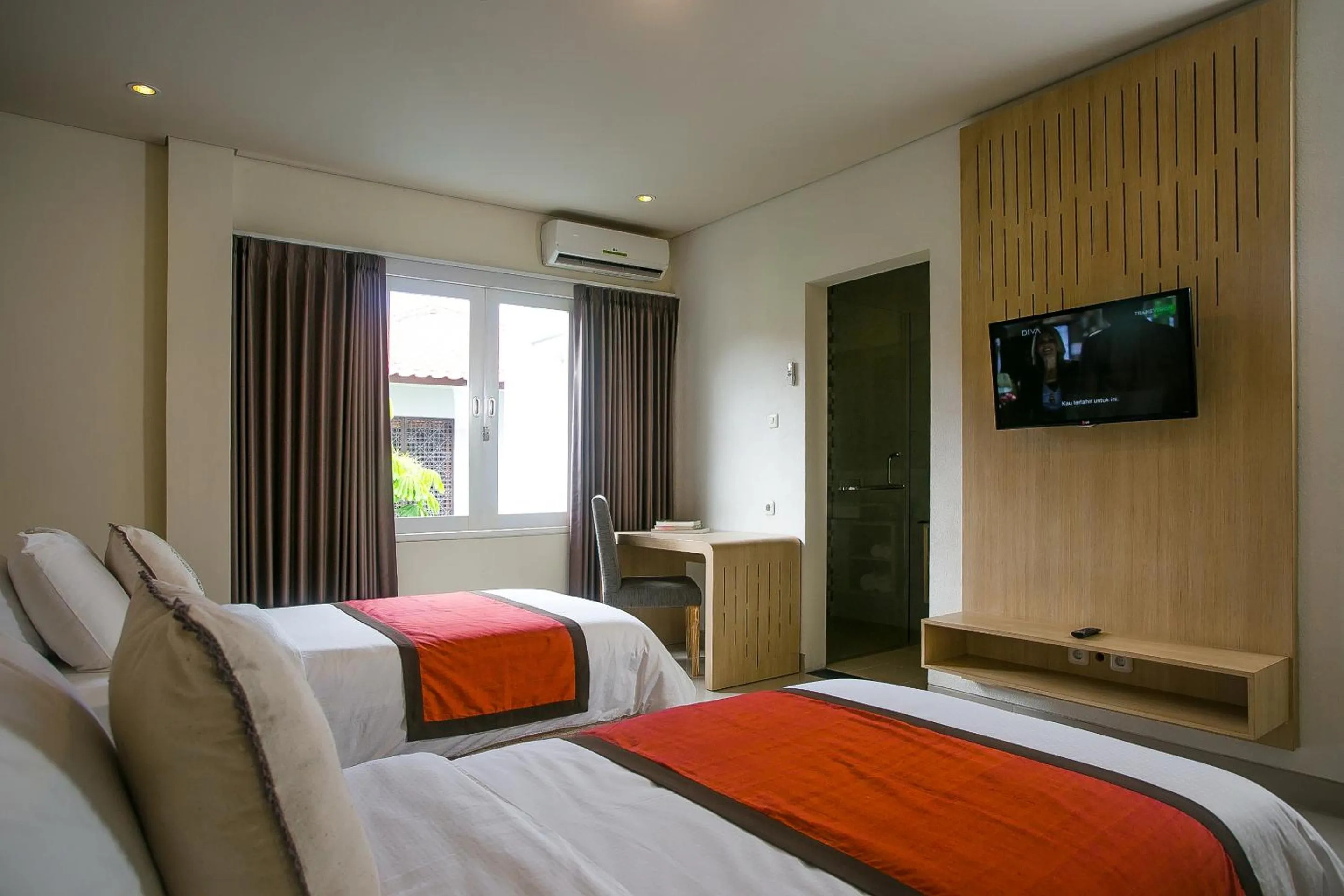 TV and multimedia, Bed in Mahalaksmi Boutique Hotel