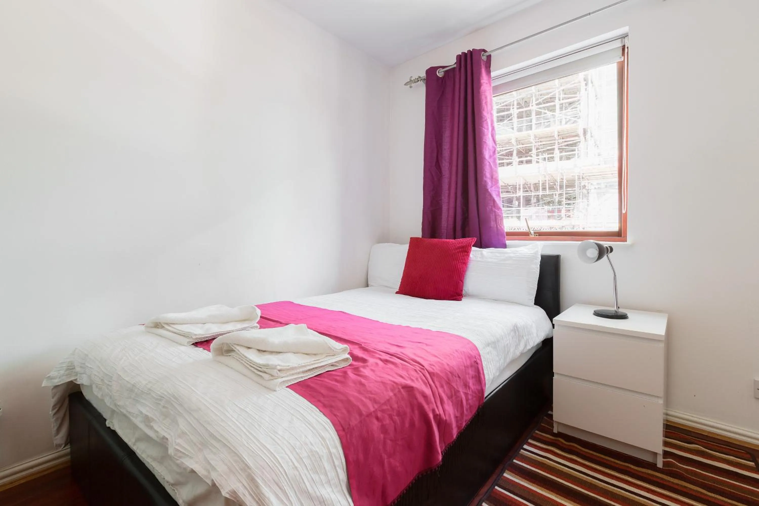 Photo of the whole room, Bed in Centra Wharf