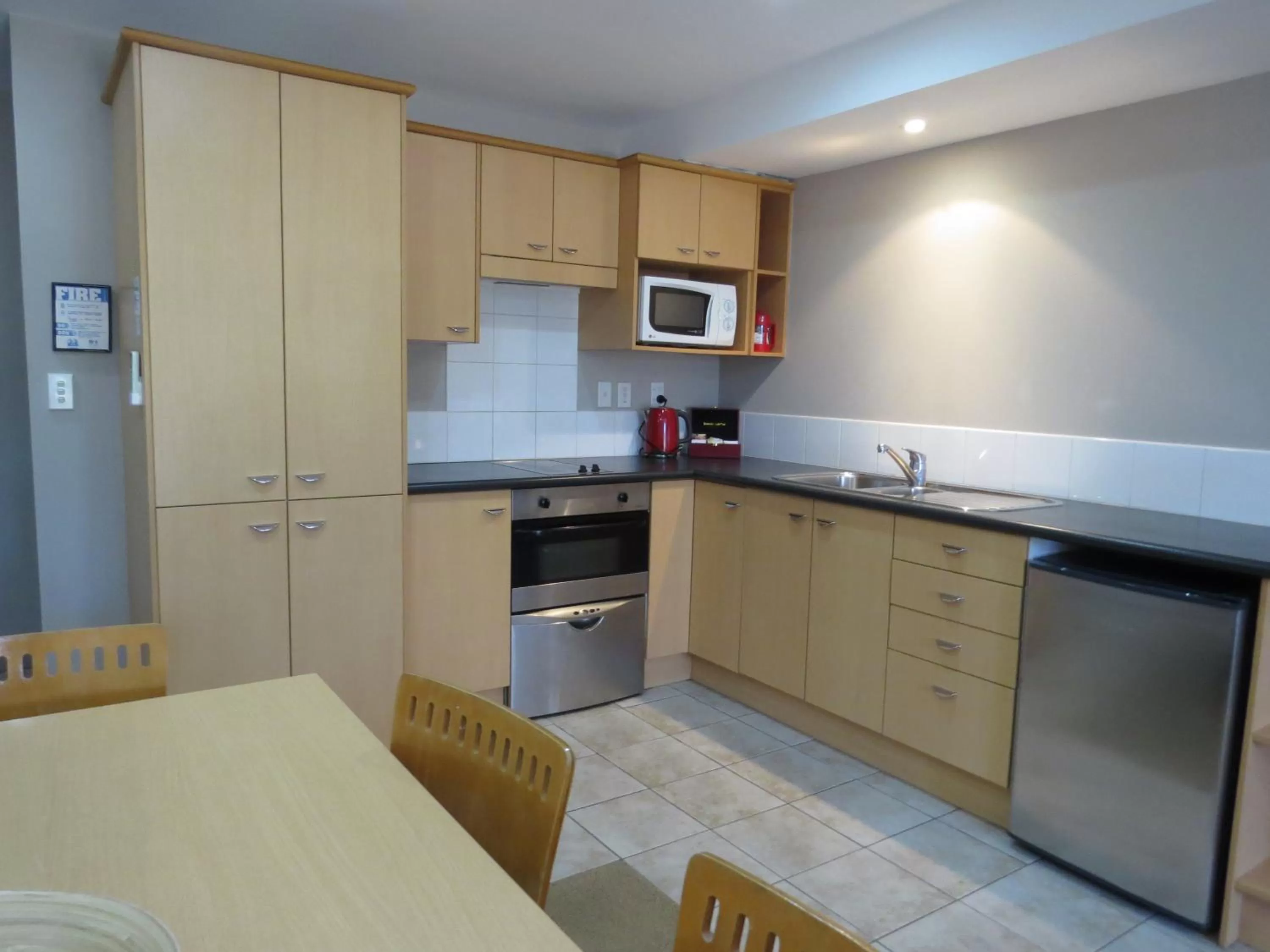 Kitchen or kitchenette in Voyager Apartments Taupo