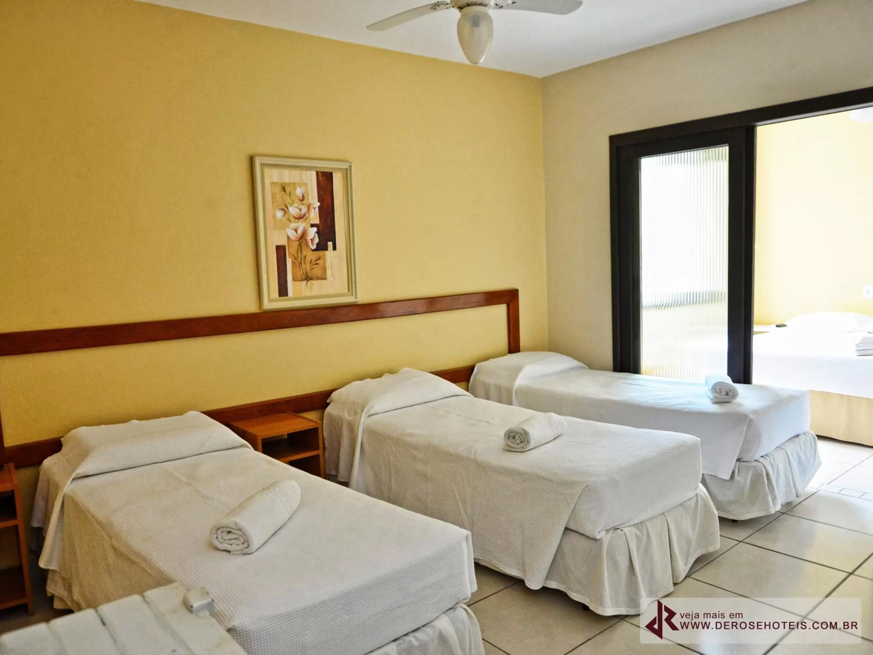 Bed in De Rose Palace Hotel