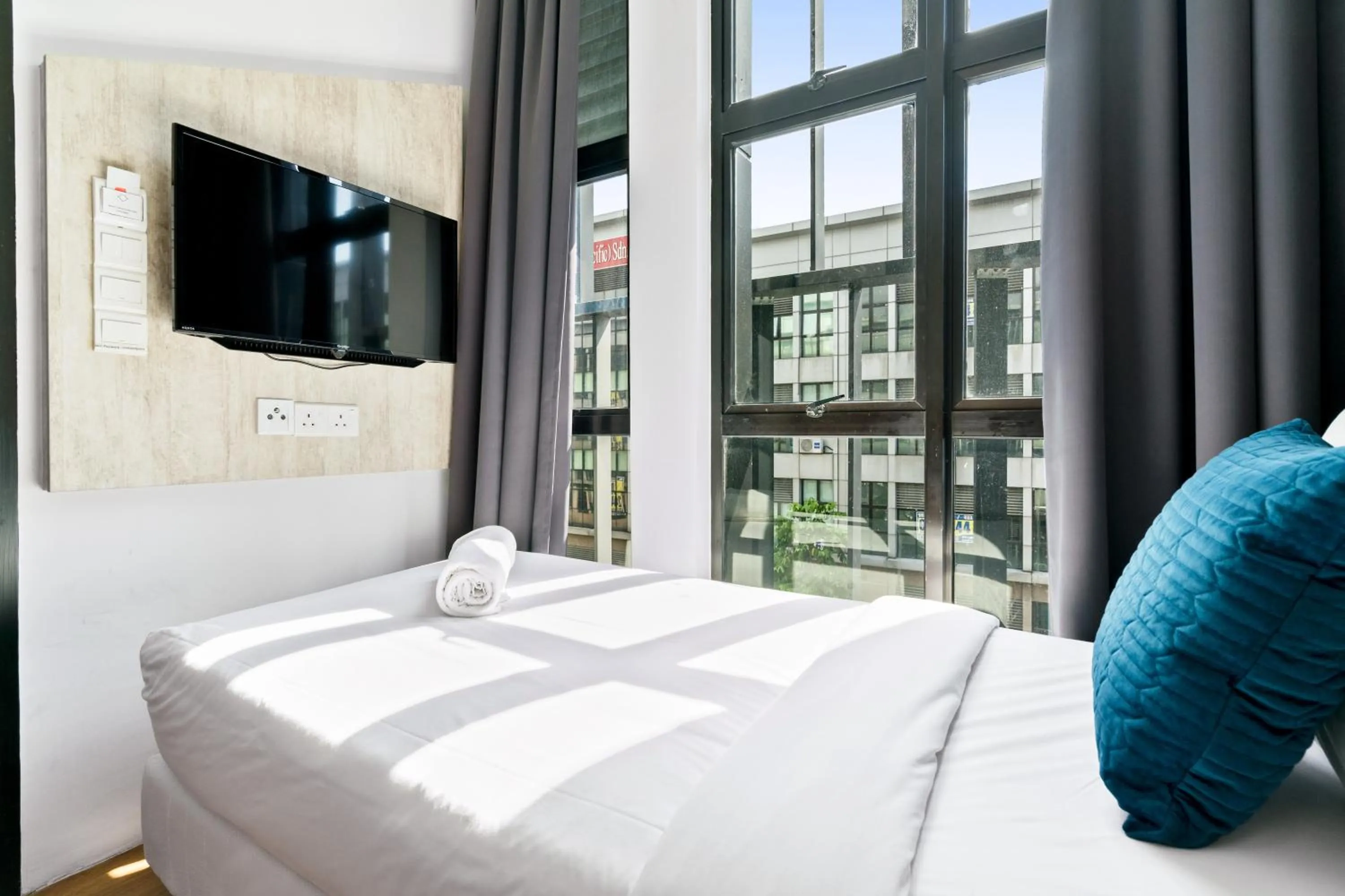 Bed in Rica Hotel Usj