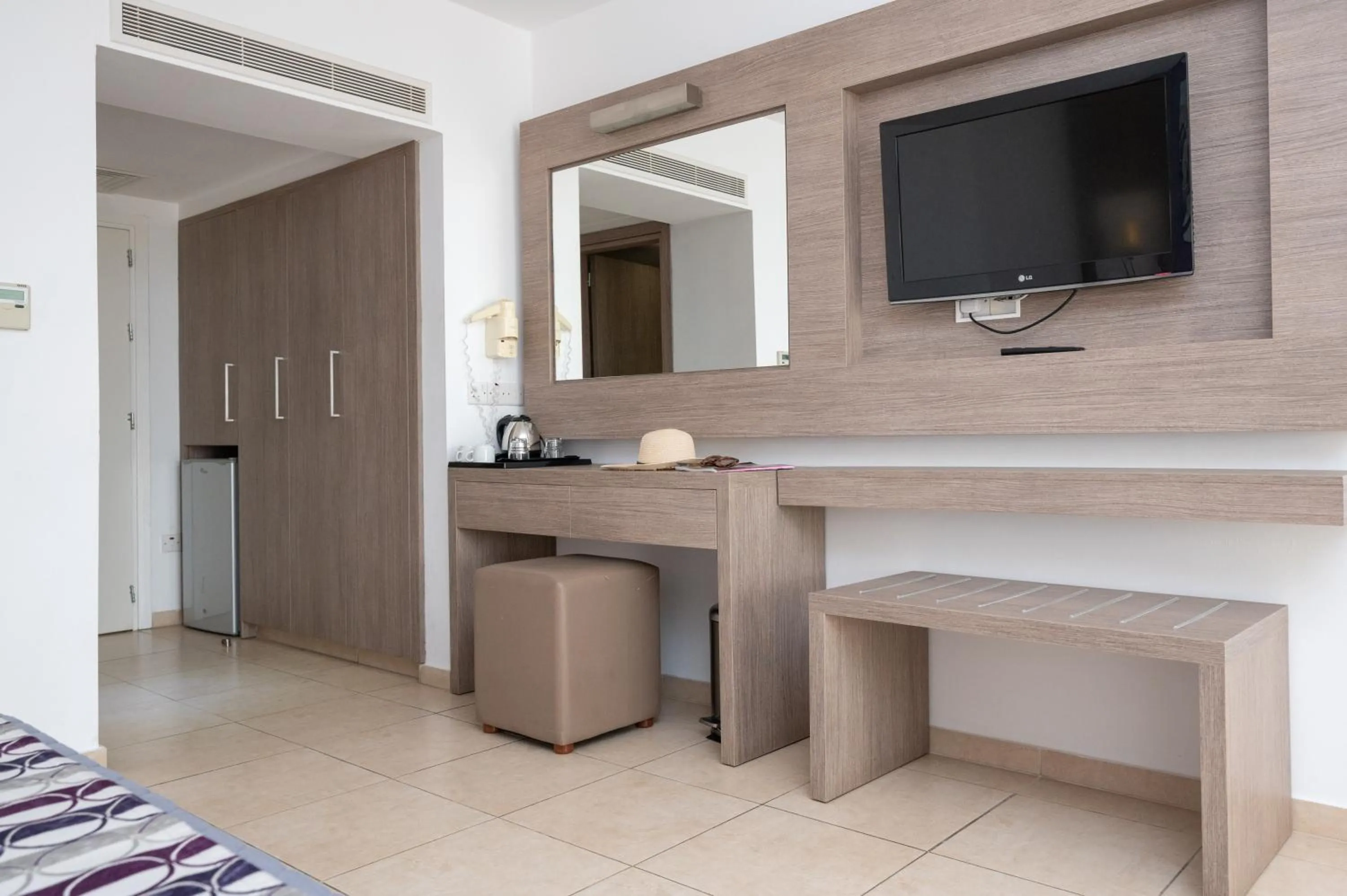 TV and multimedia in New Famagusta Hotel & Suites