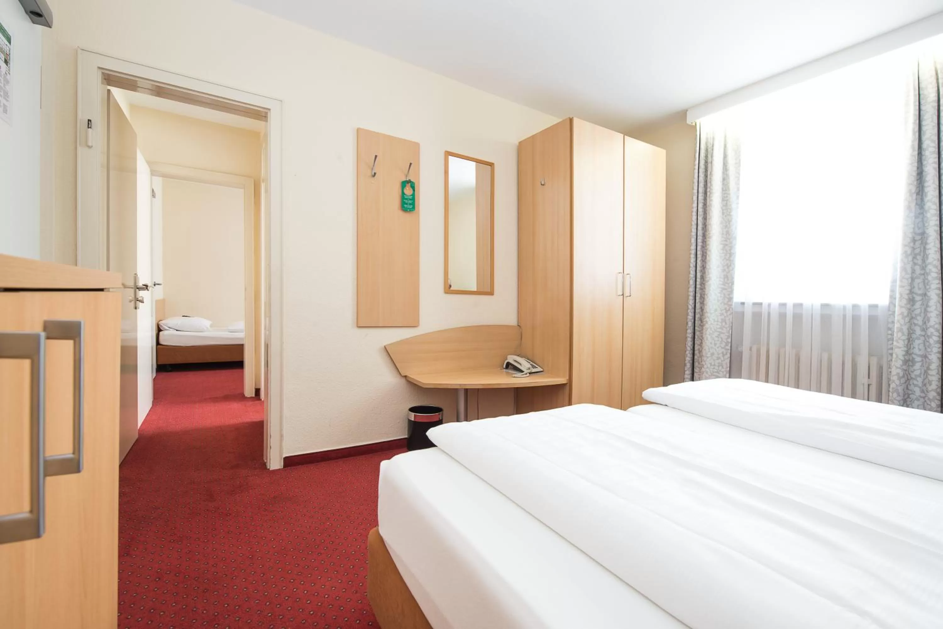 Photo of the whole room, Bed in Comfort Garni Stadtzentrum Hotel