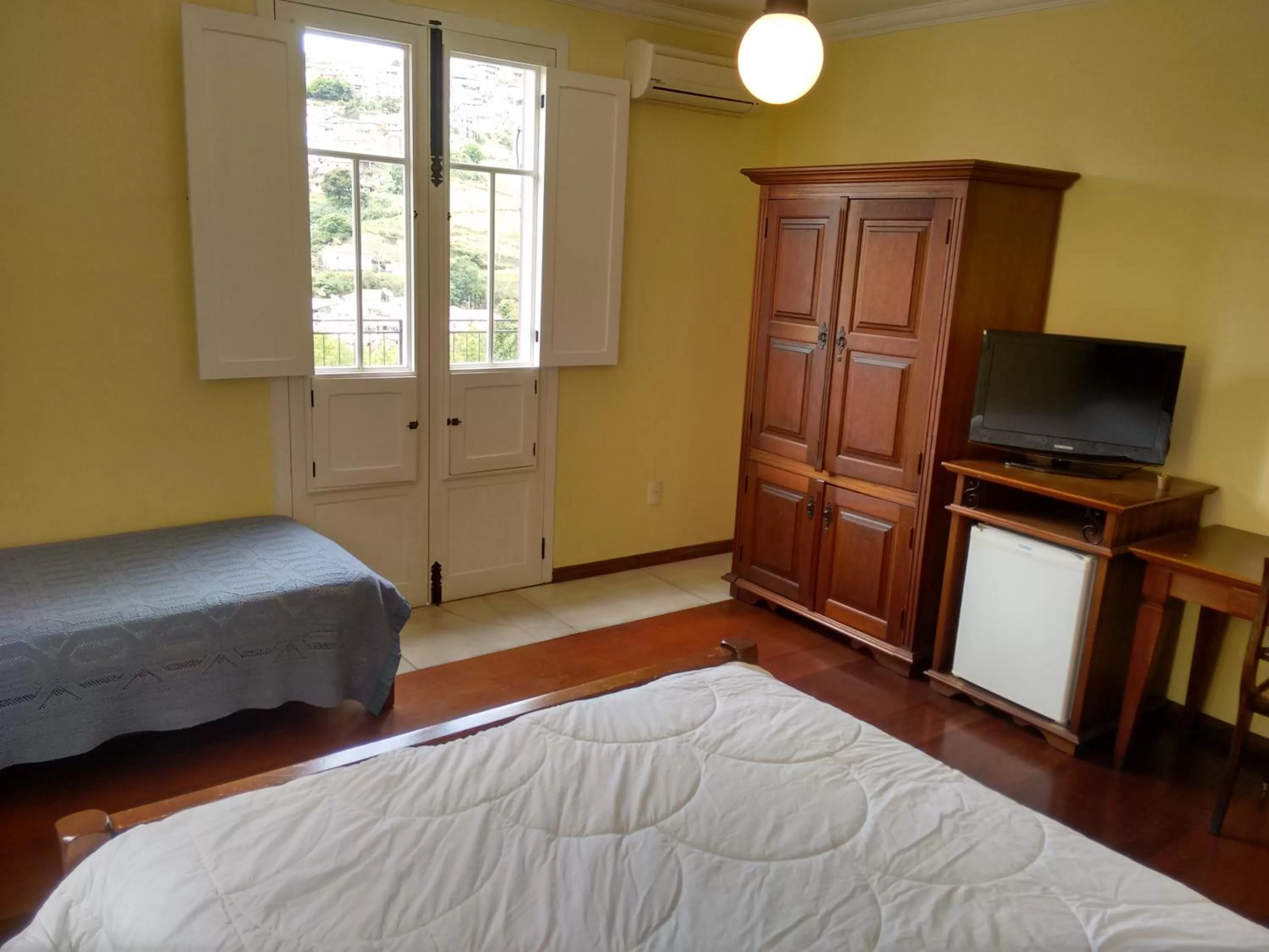 Bed in Hotel Pousada Minas Gerais