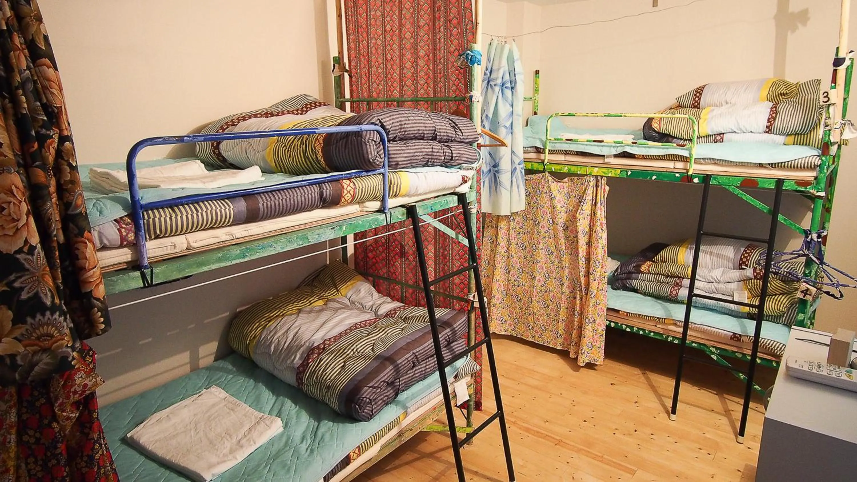 Photo of the whole room, Bed in Kamagasaki University of the Arts Cafe Garden Guest House aka Cocoroom