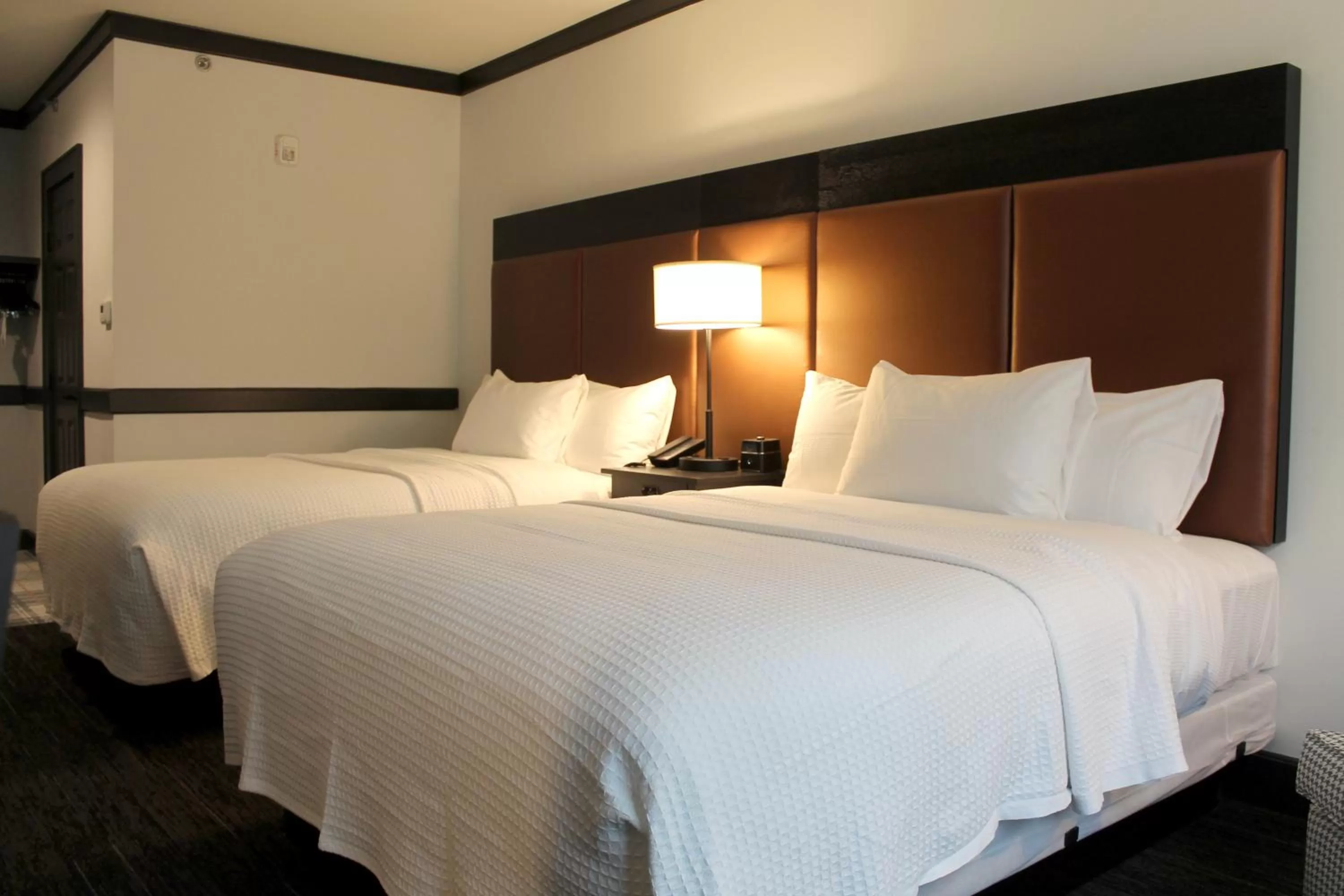 Bed in The Craftsman Inn & Suites