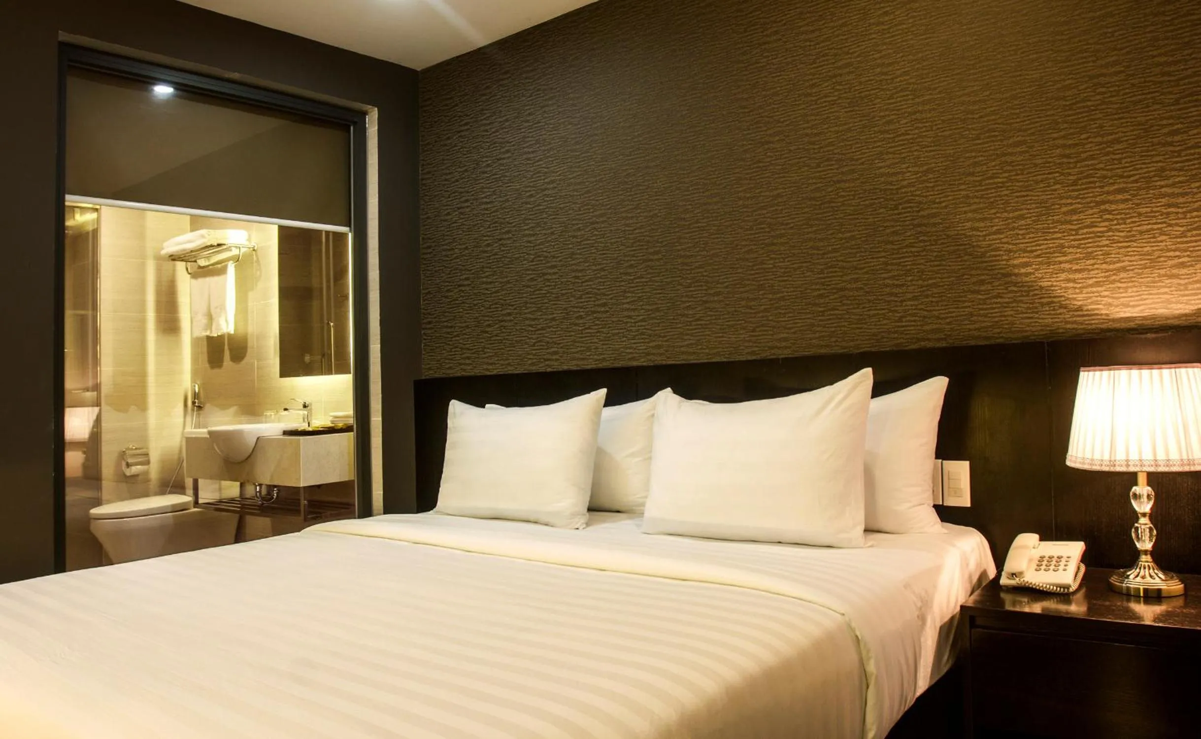 Bed in Golden Nha Trang Hotel