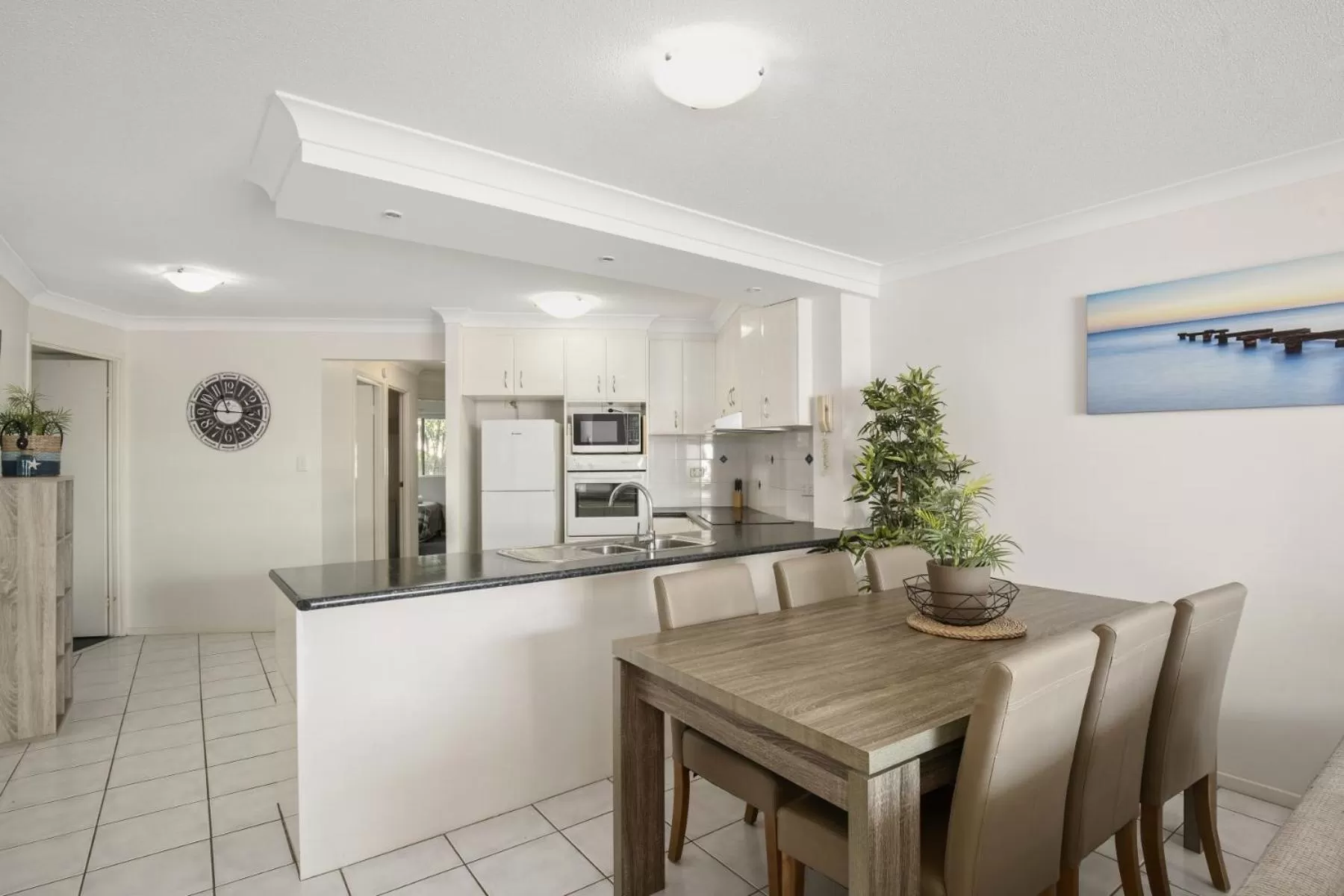 Kitchen or kitchenette in Kirra Palms Holiday Apartments