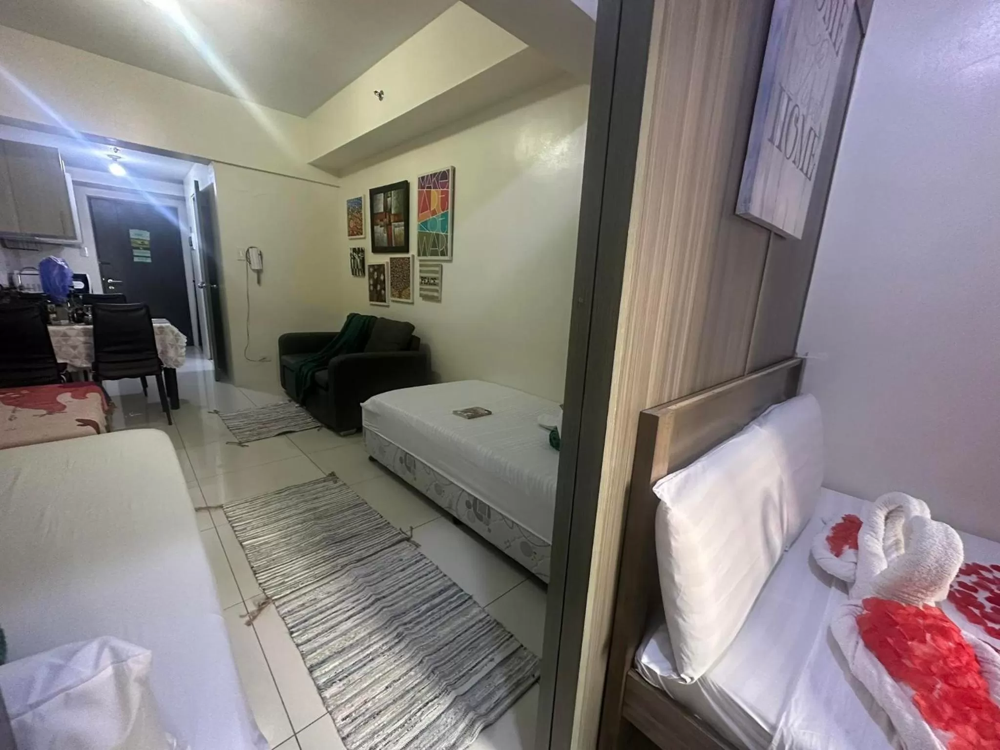 Bed in Green Residences Stays by PBYY