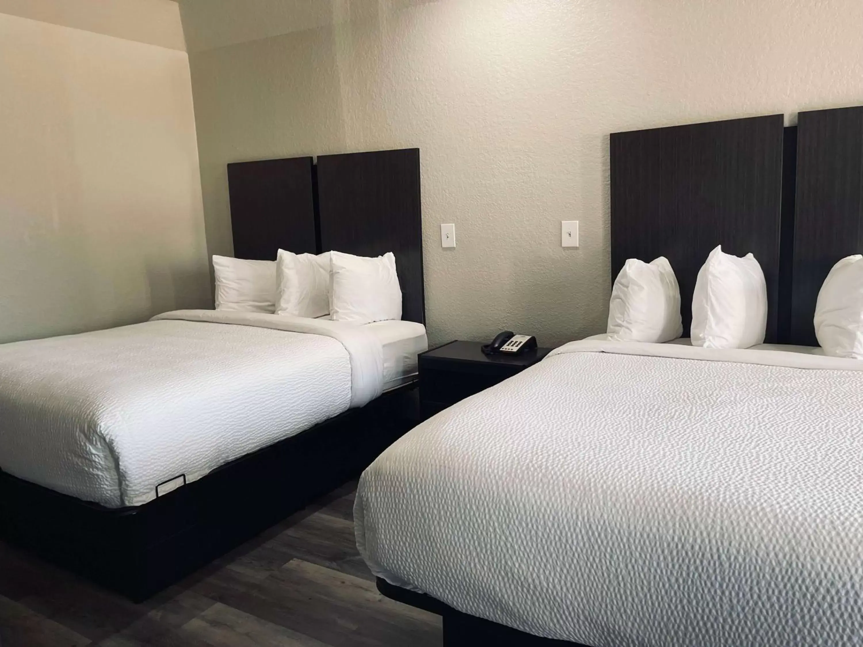 Queen Room with Two Queen Beds - Non-Smoking in Days Inn by Wyndham Dickinson TX Queen Room with Two Queen Beds - Non-Smoking in Days Inn by Wyndham Dickinson TX