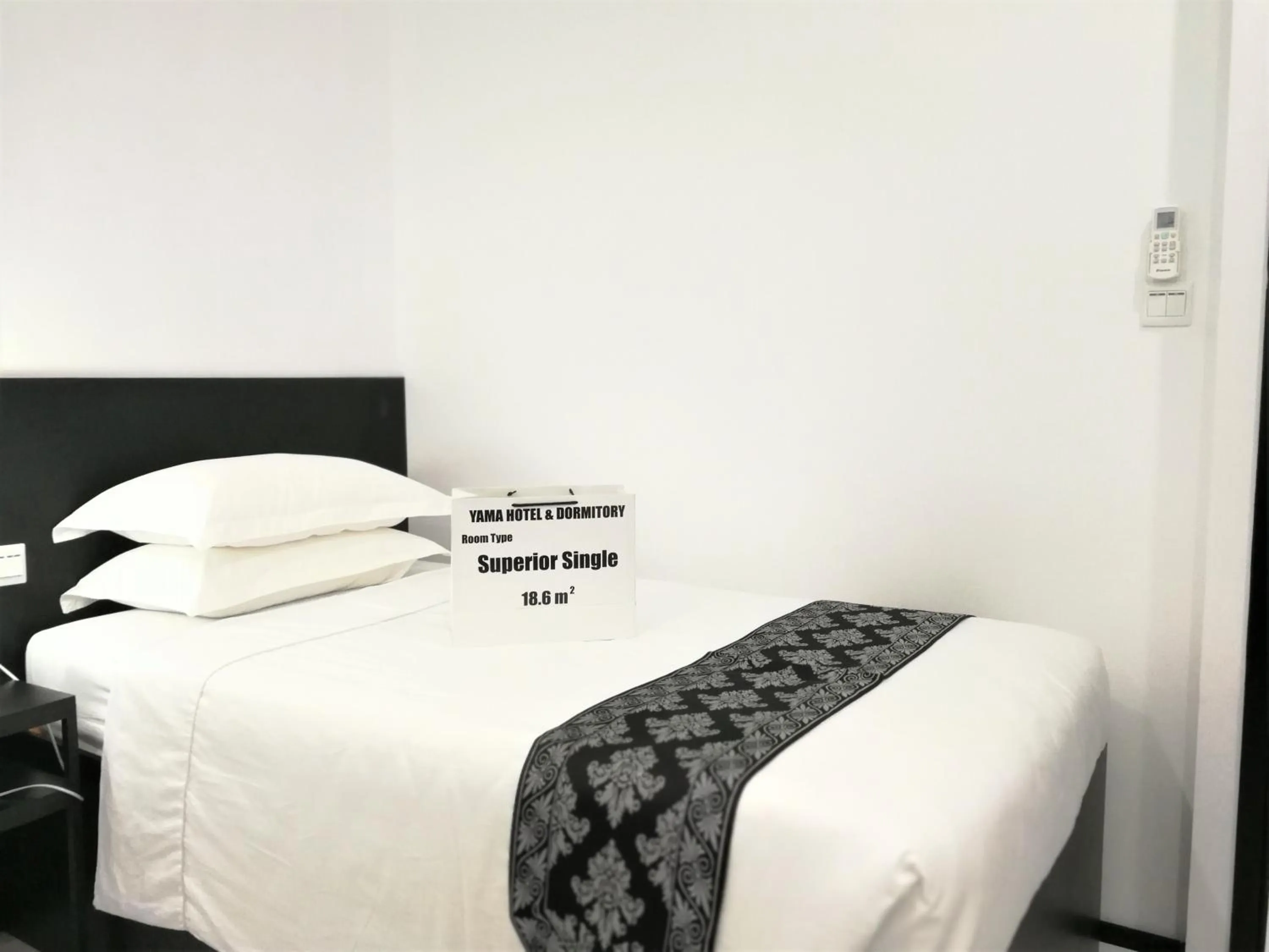 Bedroom, Bed in YAMA HOTEL & ROOFTOP BAR