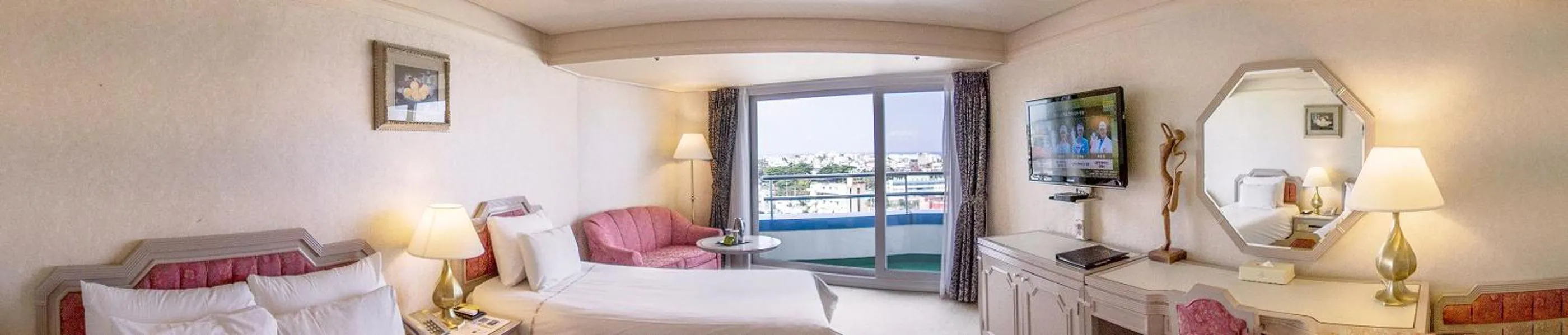 Bed in Jeju Pacific Hotel