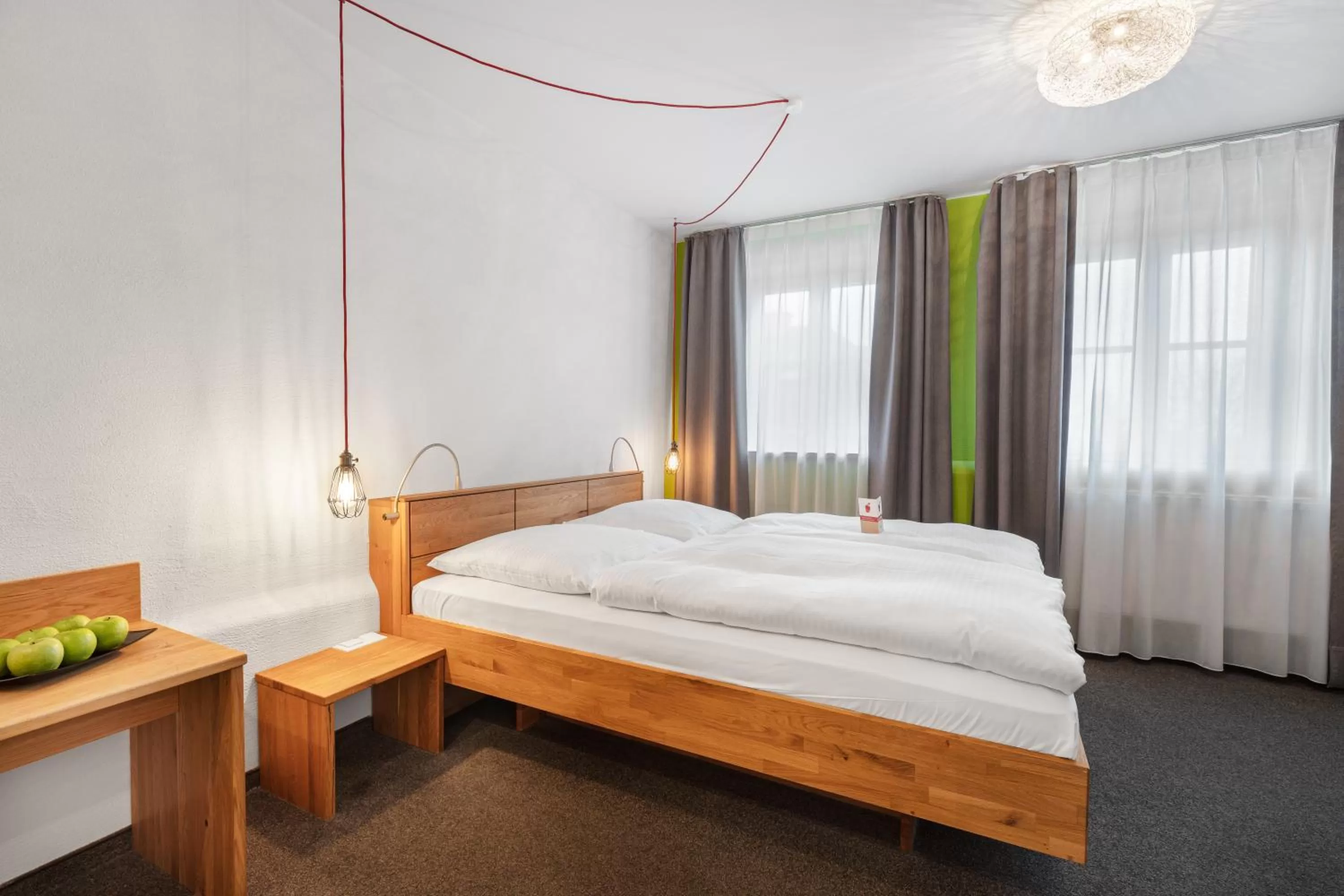 Bed in Schieners Hotel & Apfelhof Apartments