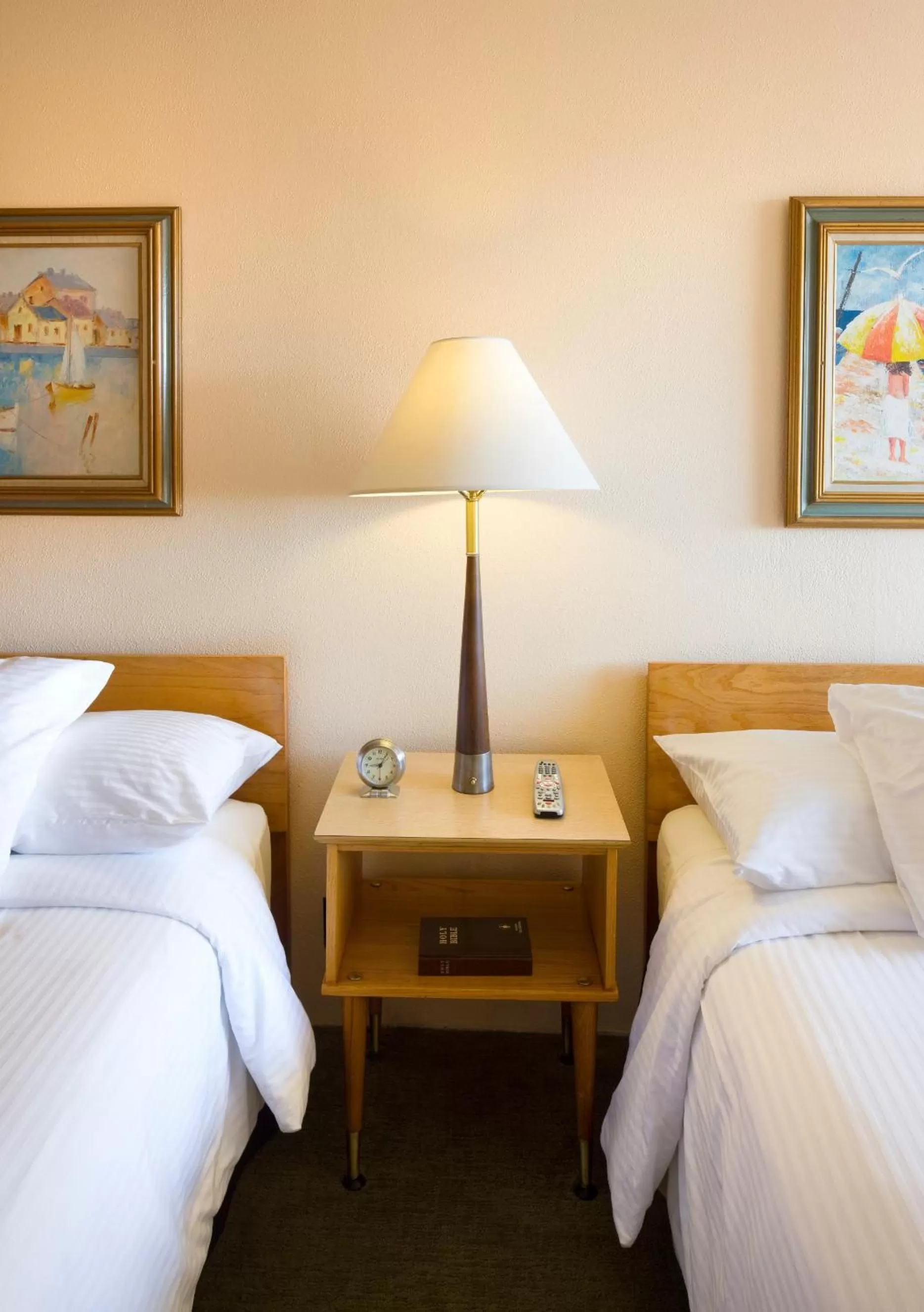 Bed in Sunset Motel Moriarty