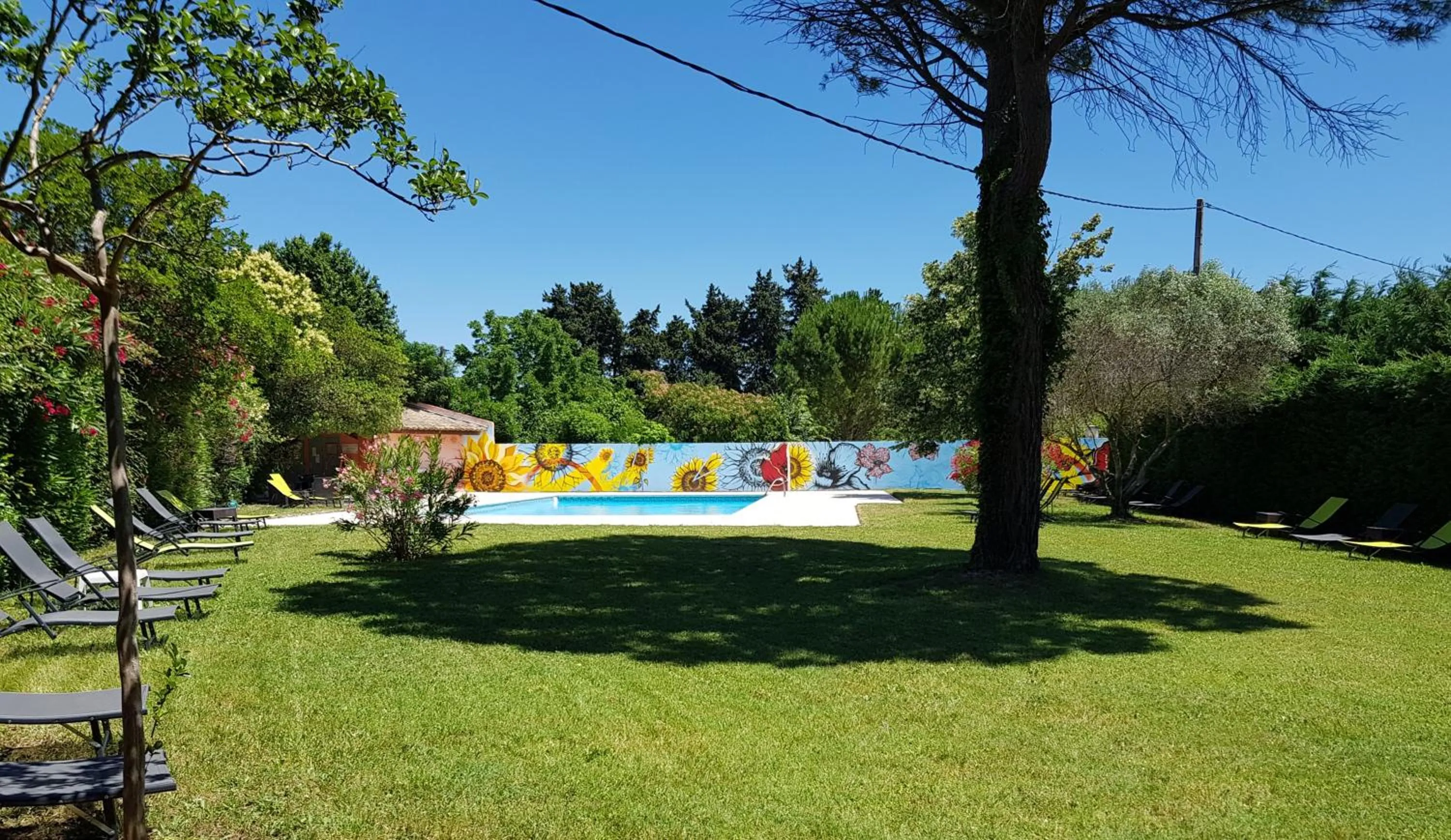 Pool view in Logis Hotel la Ferme