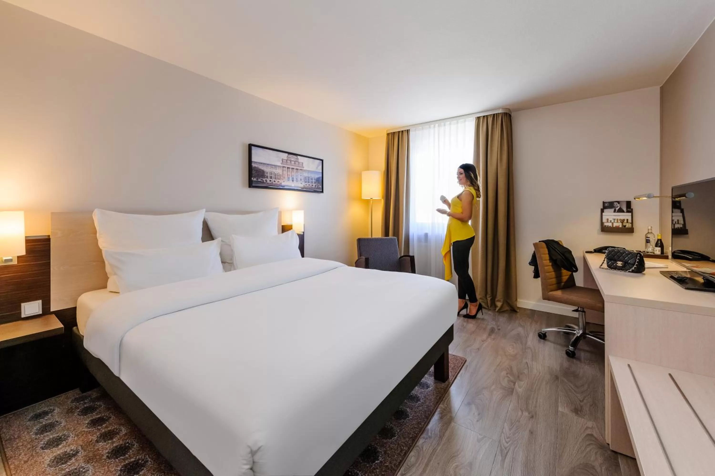 Photo of the whole room, Bed in Mercure Hotel München Süd Messe