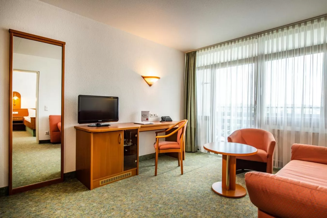 Living room, TV/Entertainment Center in feelMOOR - Gesundresort Bad Wurzach