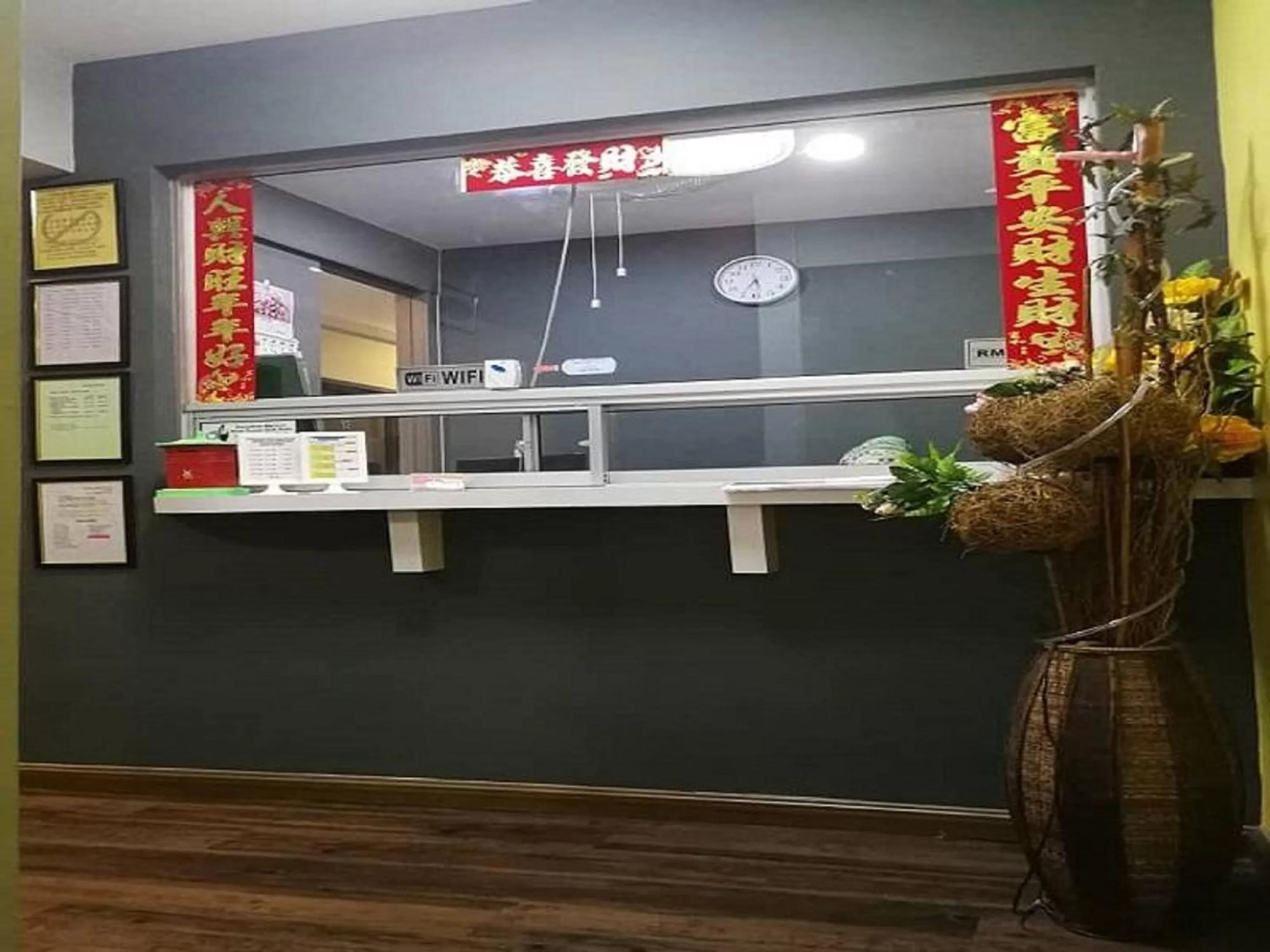 Property logo or sign in Lucky Hotel