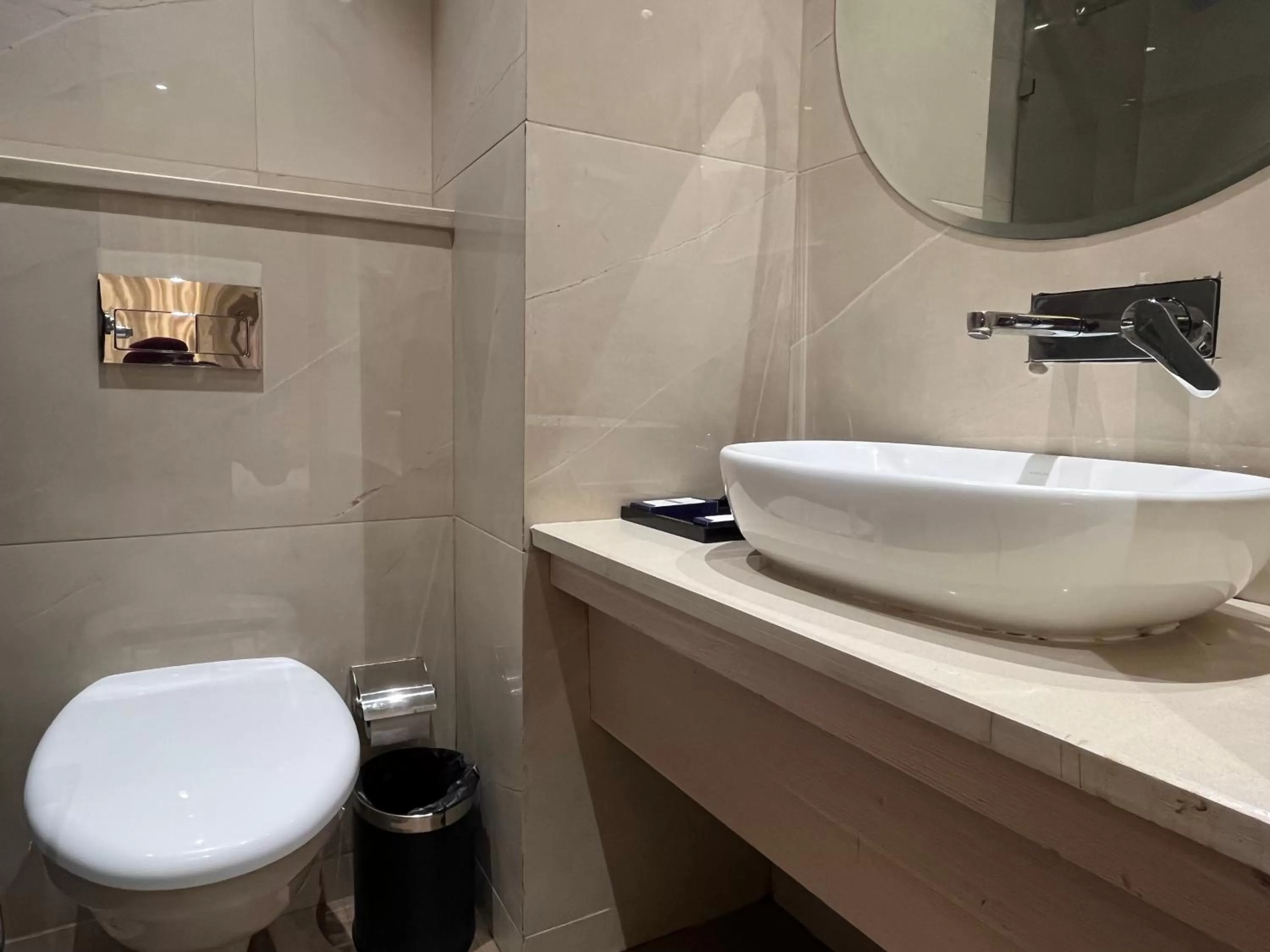 Bathroom in RRV Hotel